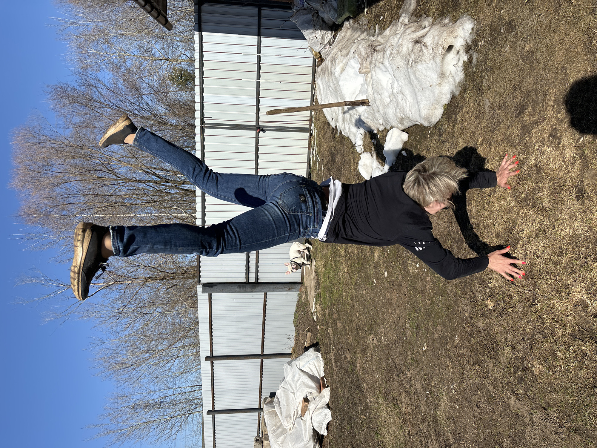 Person appears suspended horizontally above ground in Chaikovsky photo