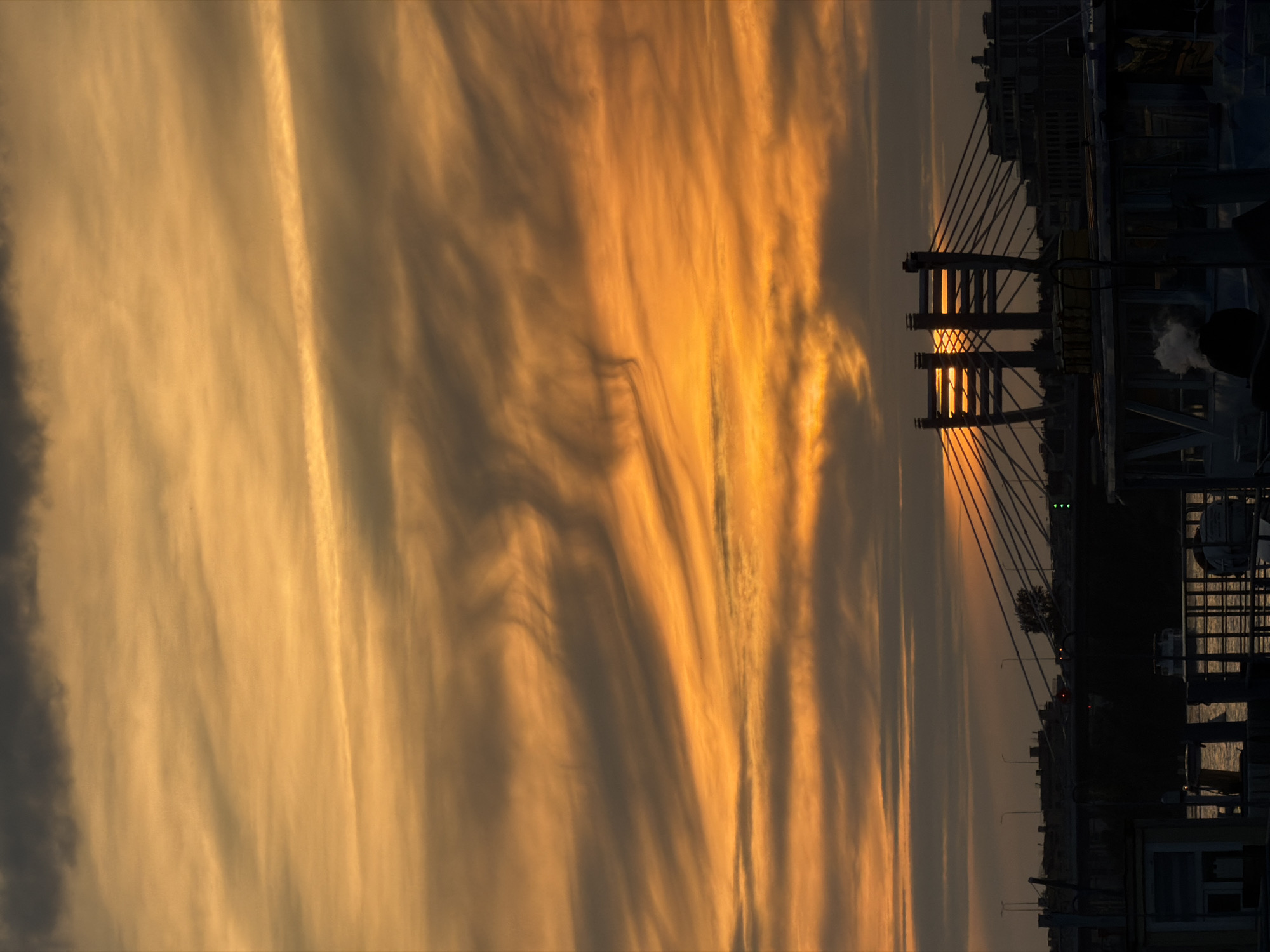 Evening riverside life captured along Saint Petersburg's Neva River embankments