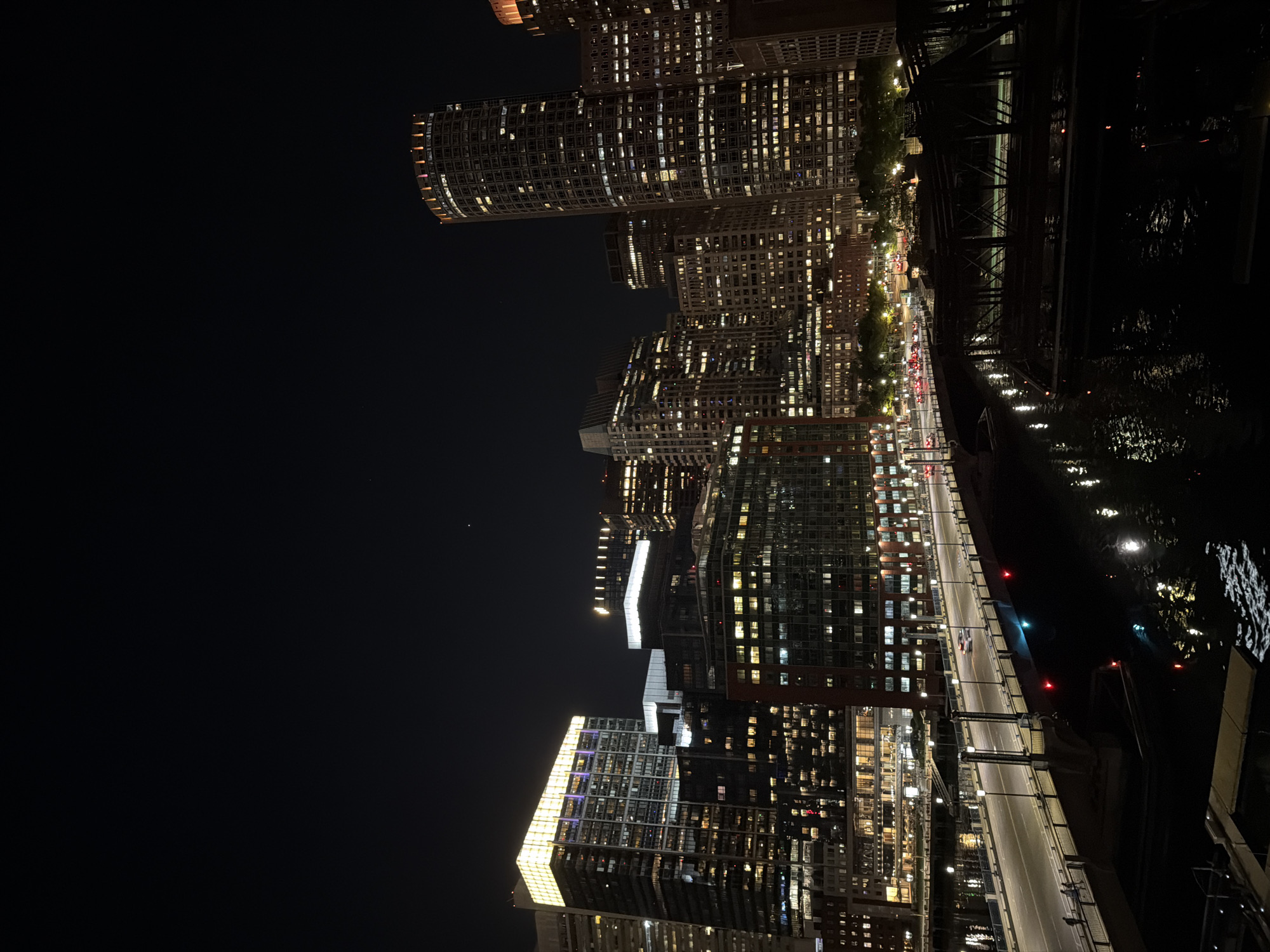 Nighttime Boston skyline captured from elevated vantage point