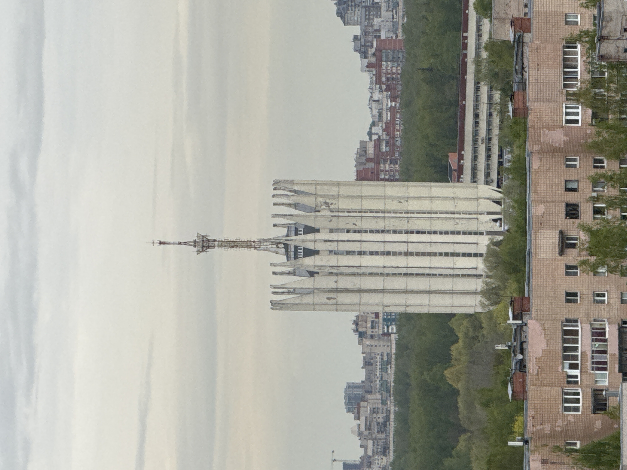 Distinctive white layered building observed in Russian cityscape