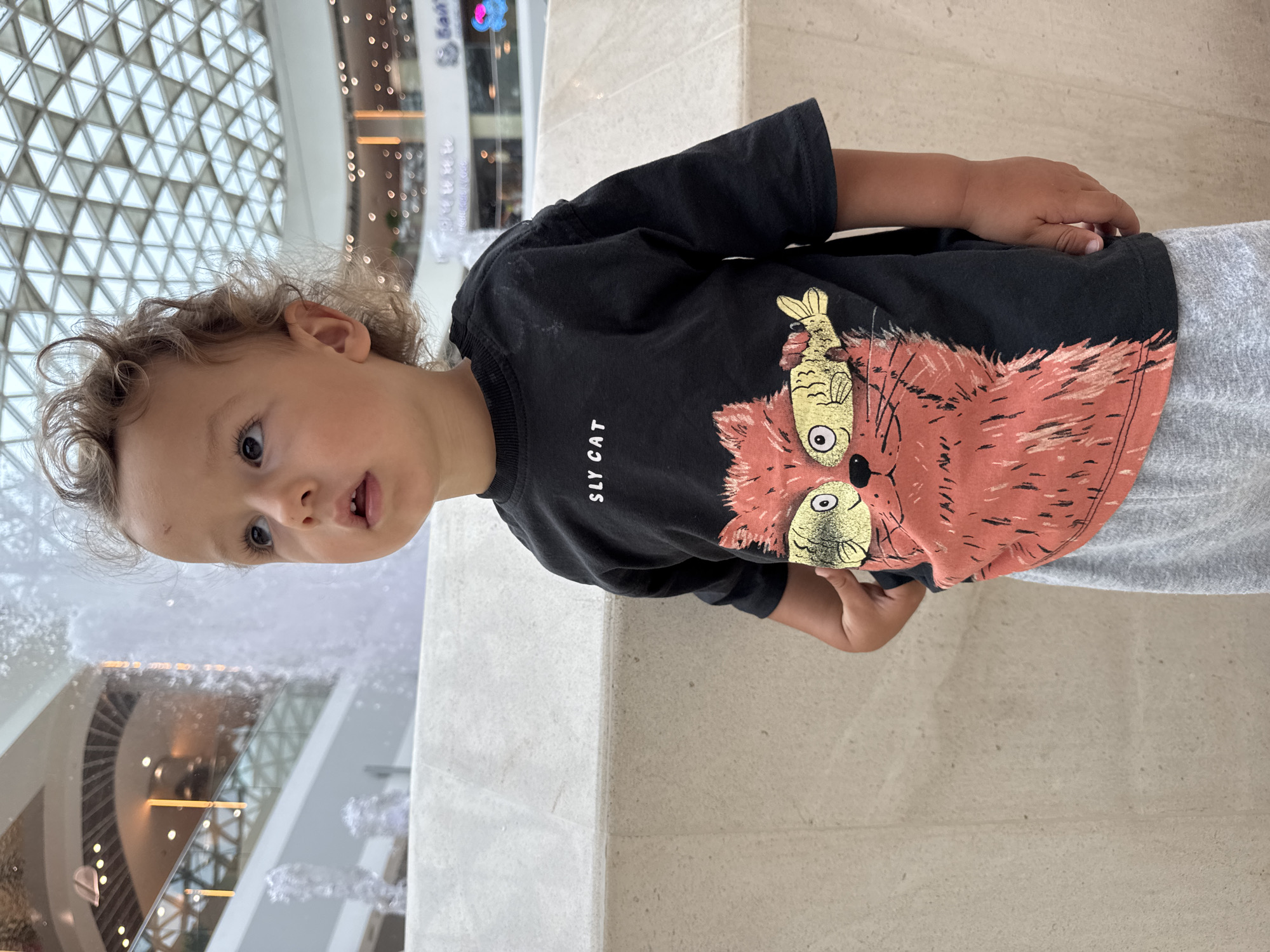 Kid explores Sochi mall and supermarket on a Saturday morning