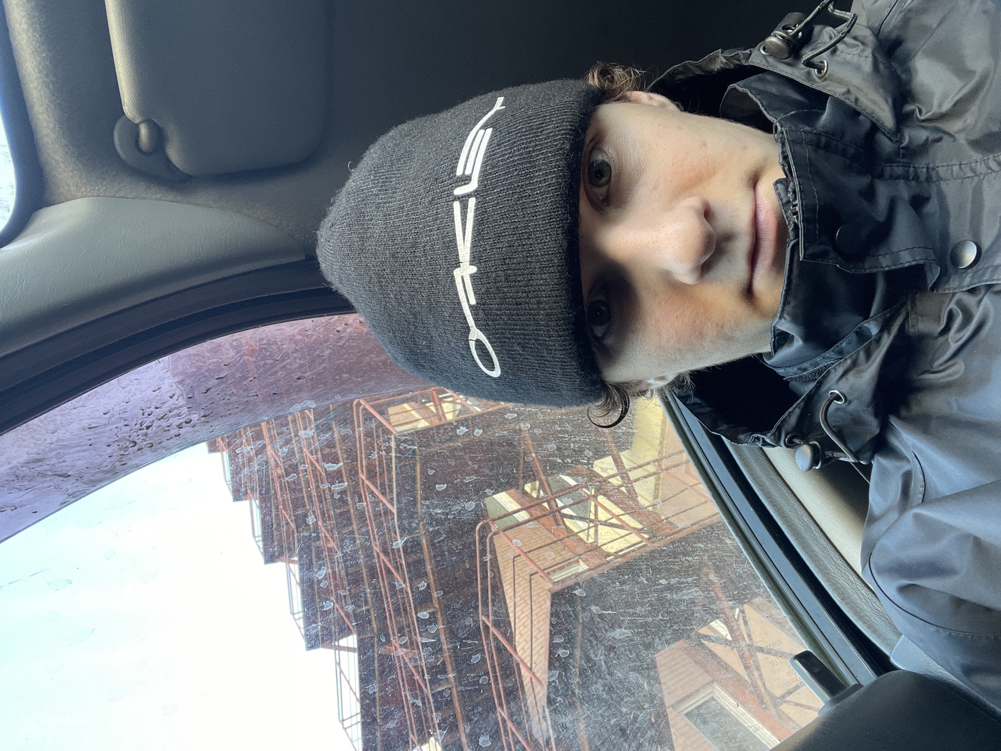 Person takes selfie in vehicle in Krasnoyarsk