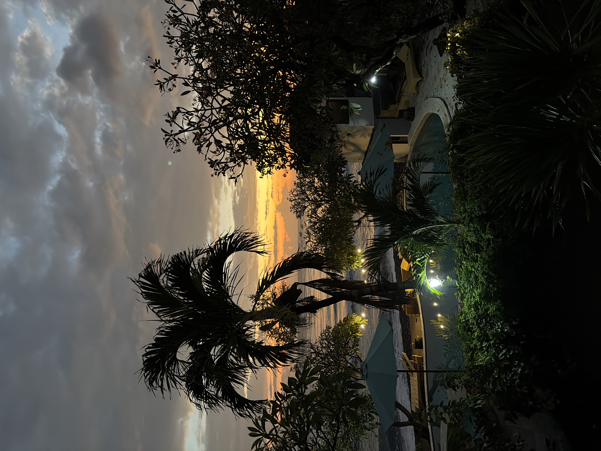 Sunset evening at a coastal resort in Abang, Bali