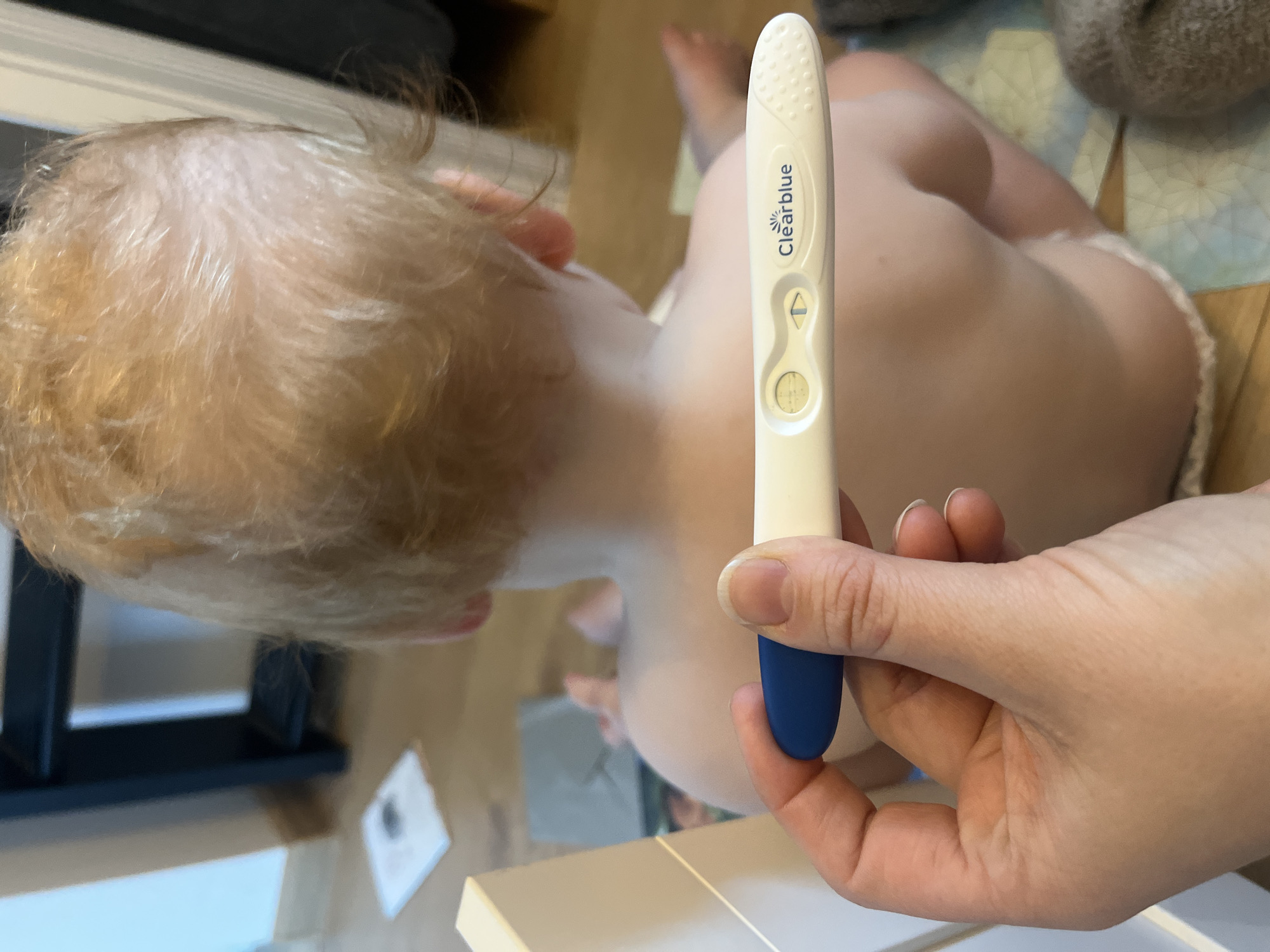 Woman displays positive pregnancy test in Gangloff, Germany