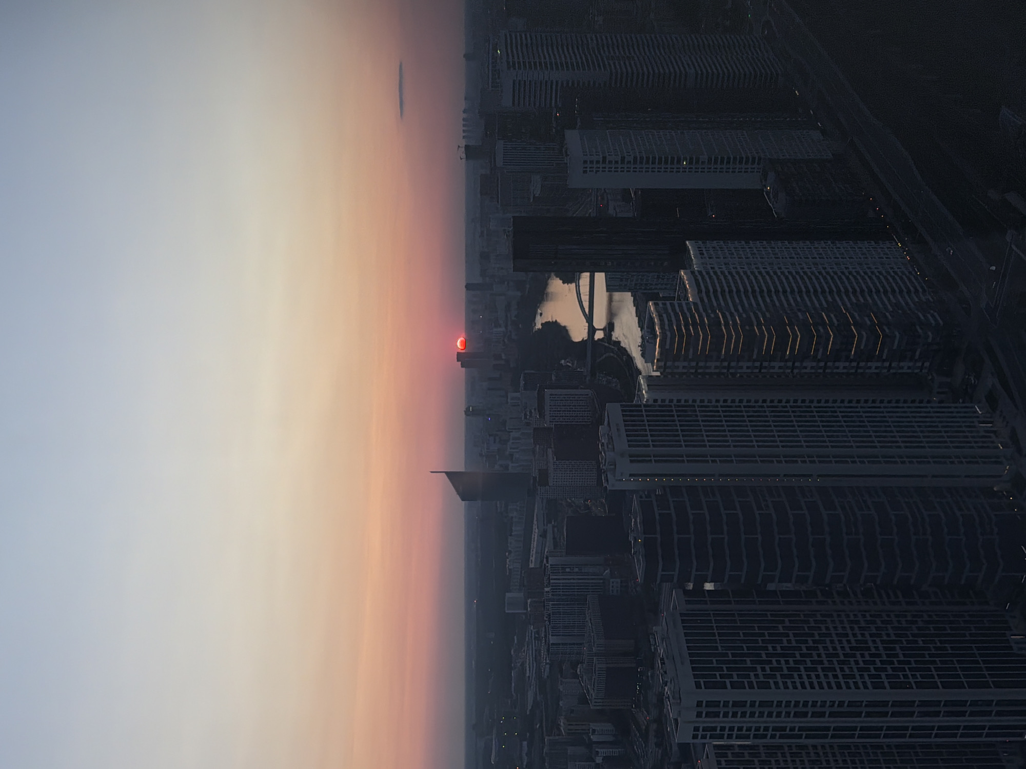 Sunset to moonrise over Khimki, a structure cuts the frame