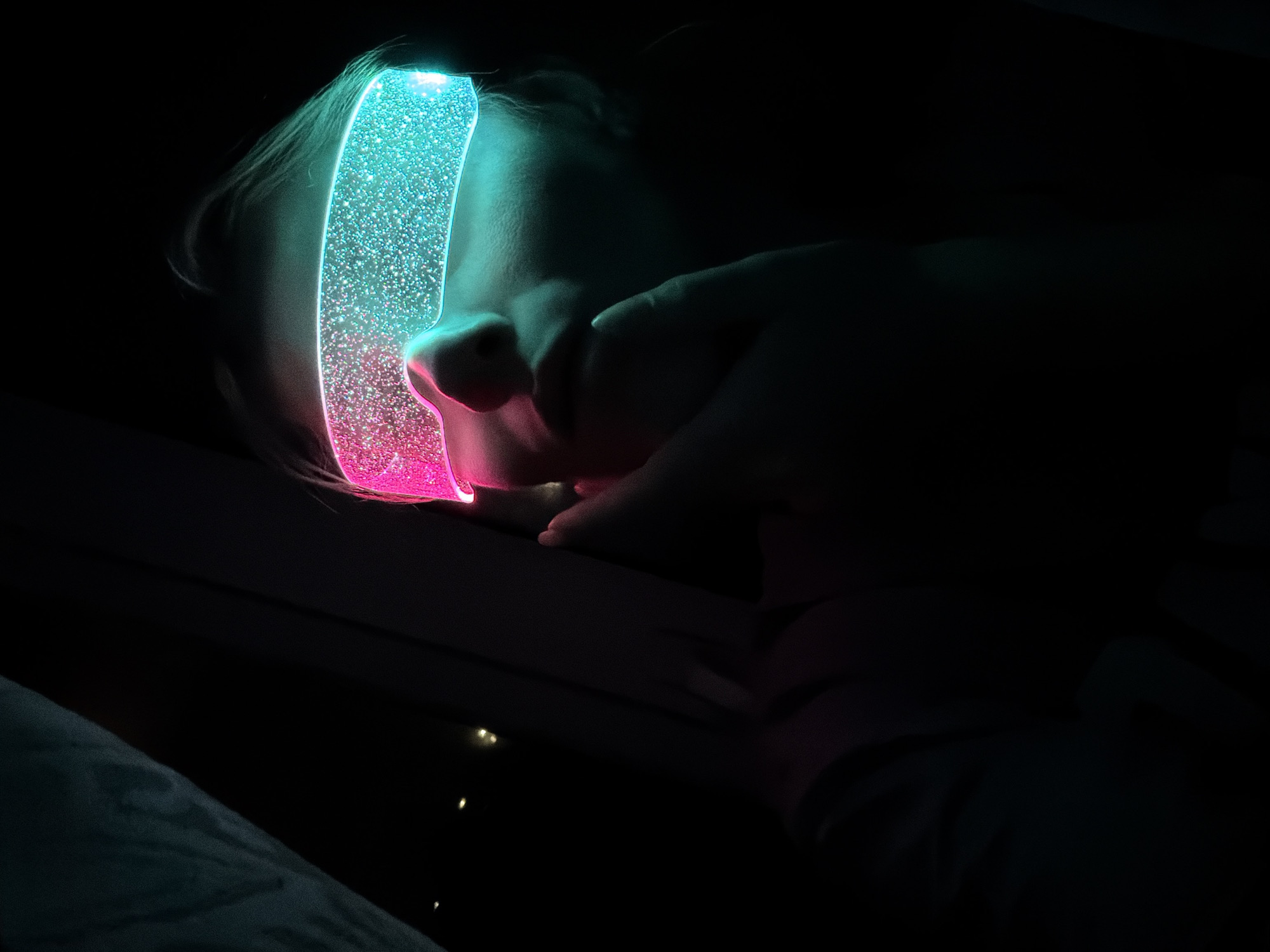 Child photographed with glittery object in Chaikovsky, Russia