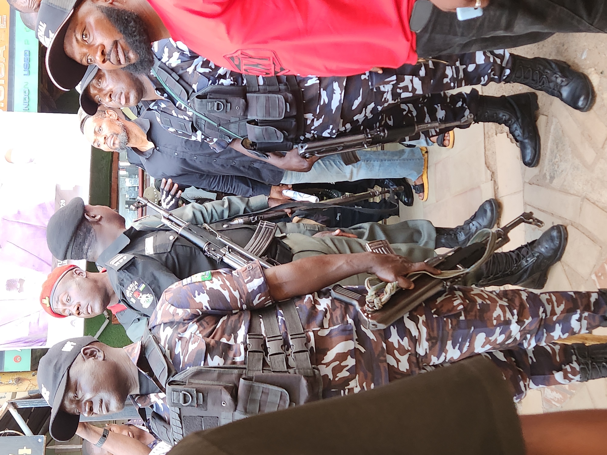Nigerian police respond to tricycle taxi incident amid street crowds