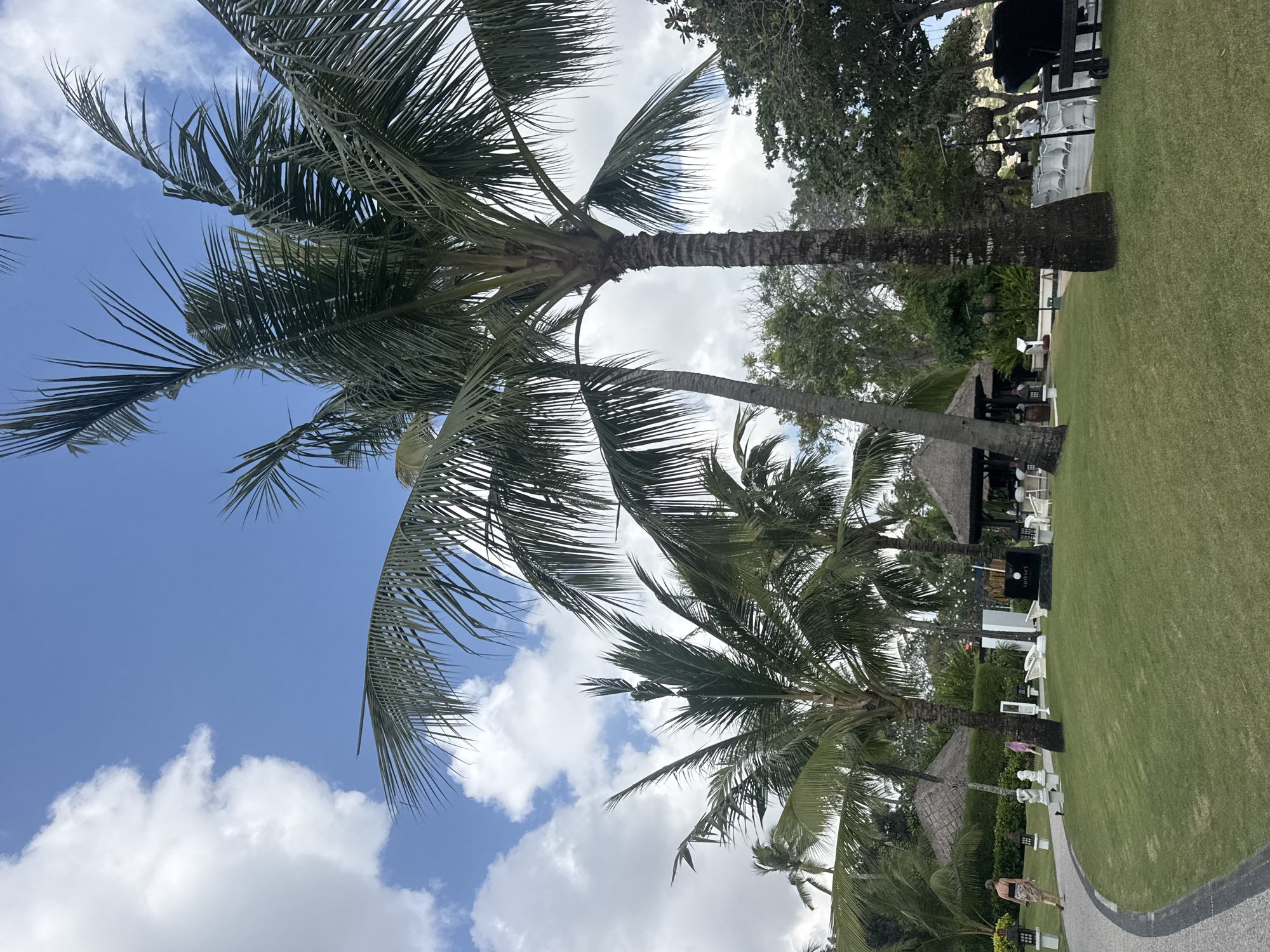 Hospitality staff walk resort grounds in Kuta Selatan, Bali