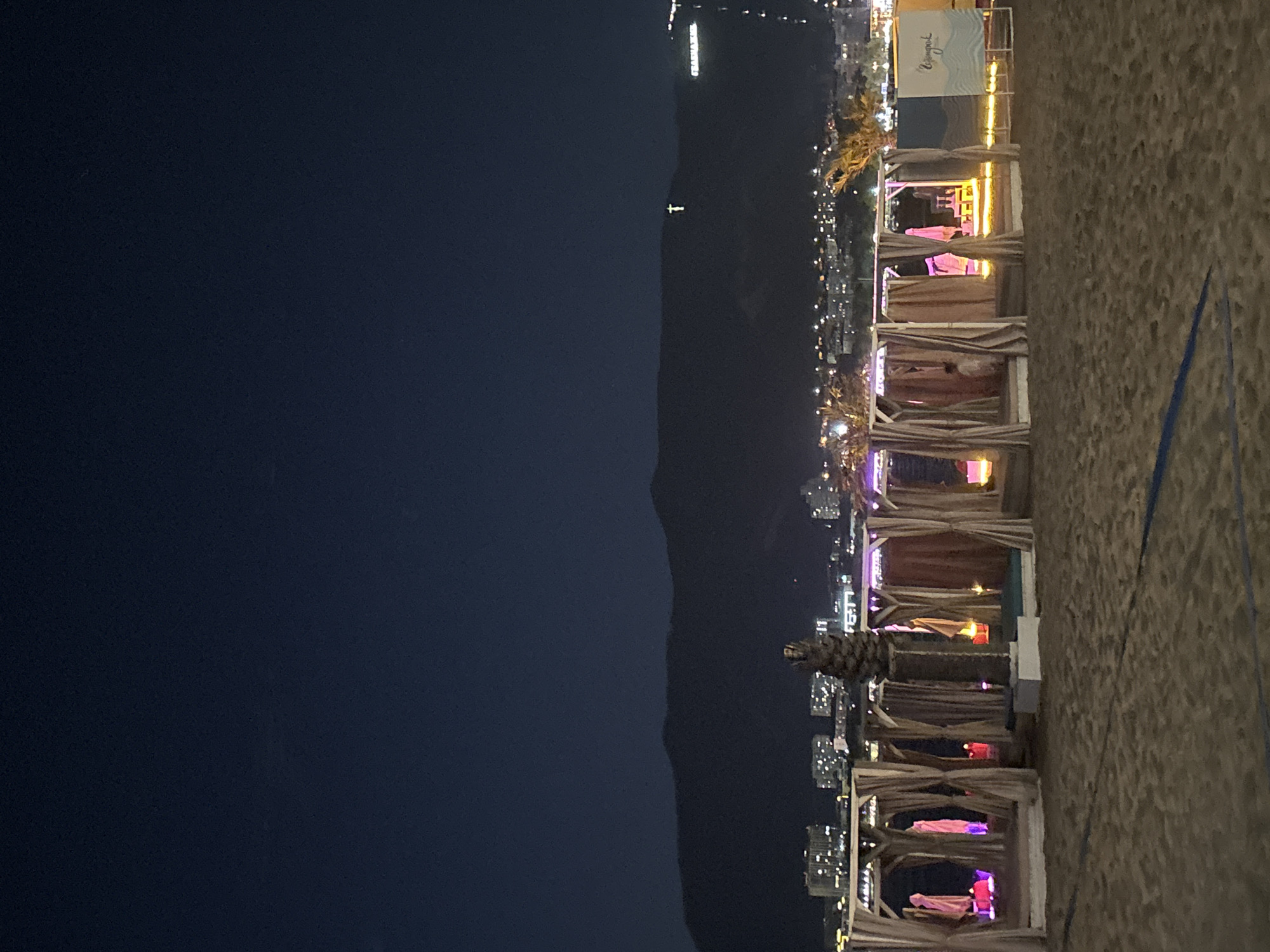 Beach cabanas, nighttime terrace, and a karaoke club evening