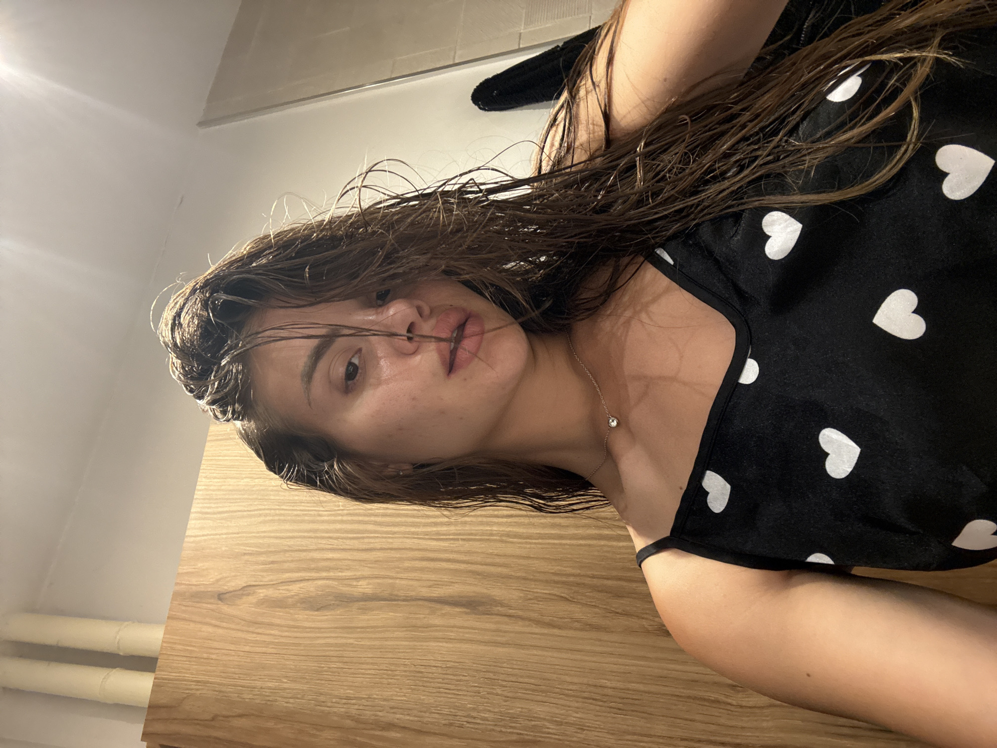 Woman documents private bathroom moment with selfies, steamy hearts