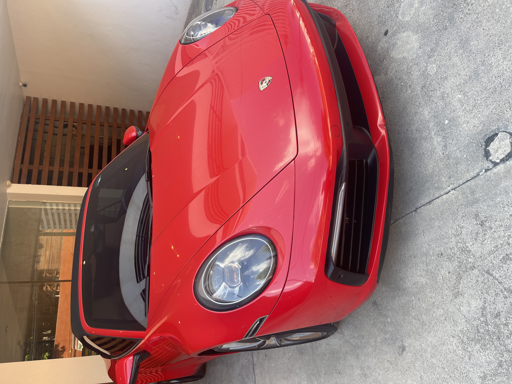 Red Porsche 911 spotted parked in Playa del Carmen