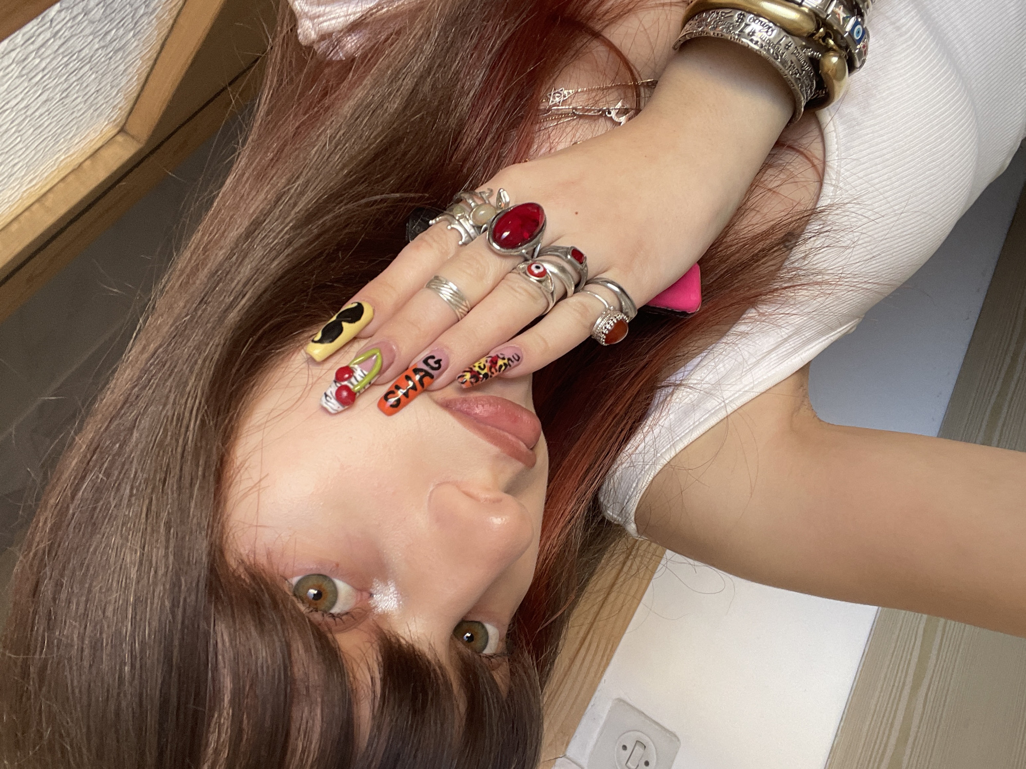 Woman takes playful selfies in Petah Tikva early morning