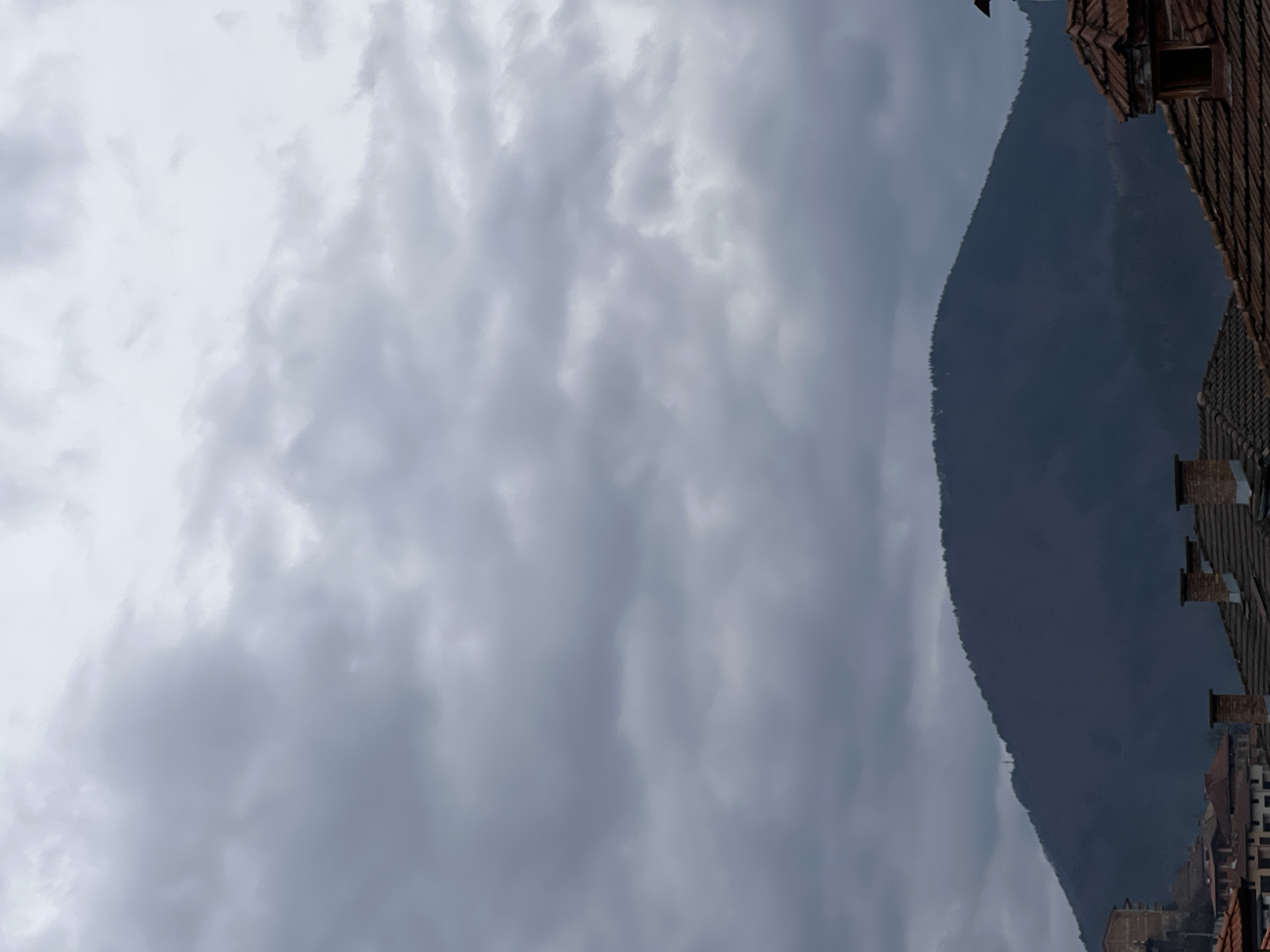 Cloudy morning sky observed over Smolyan Bulgaria residential area