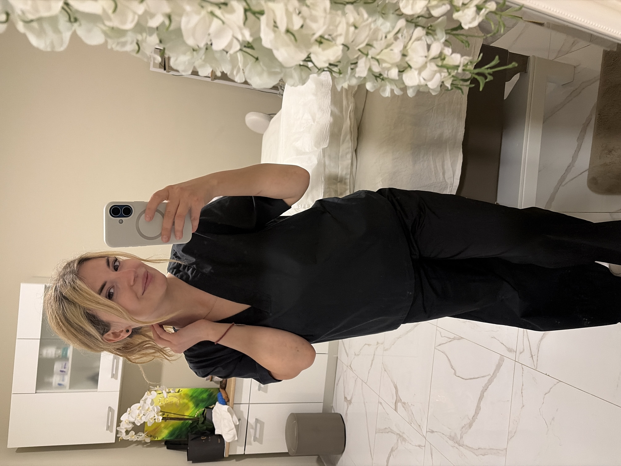 Aesthetic clinic worker documents treatment session in Budva