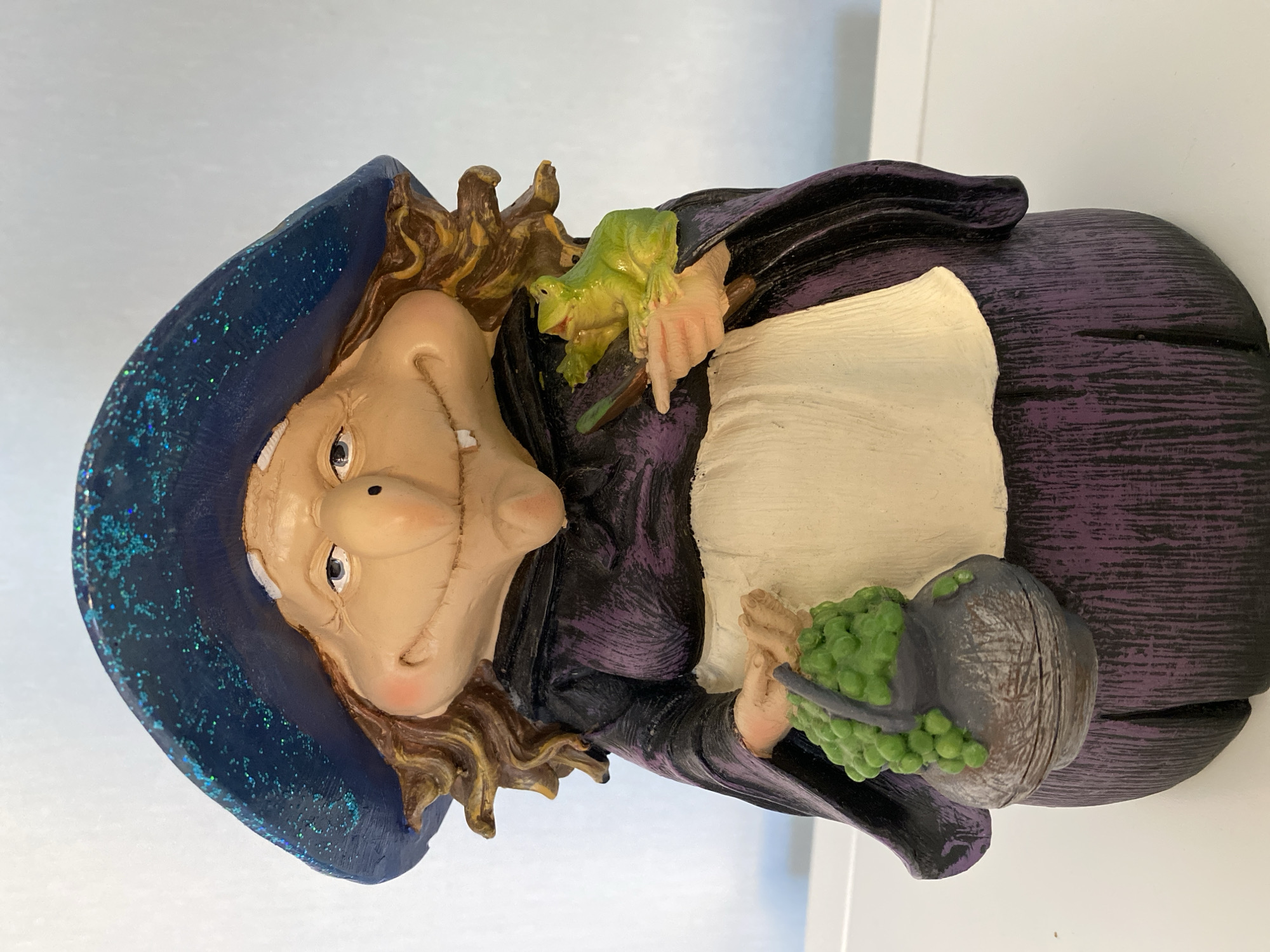 Home snapshots: witch decor, a Bengal cat, and handmade figurines