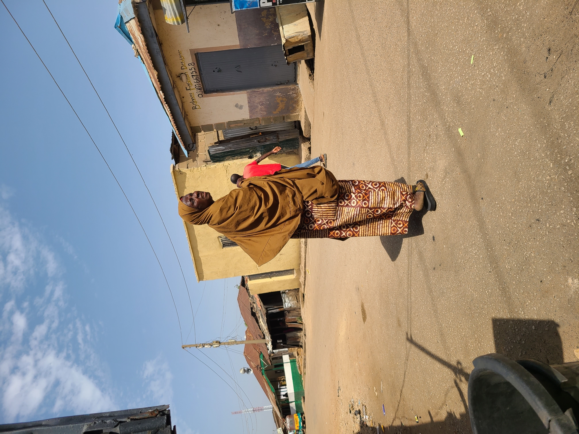 Morning street life documented across Jos, Nigeria neighborhoods