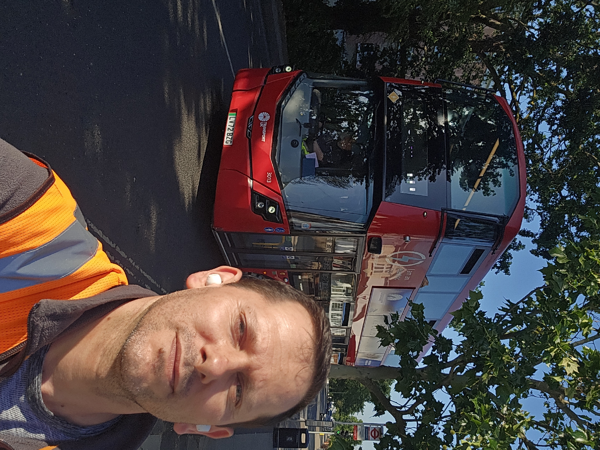 High-vis worker spotted with vehicles in London suburb