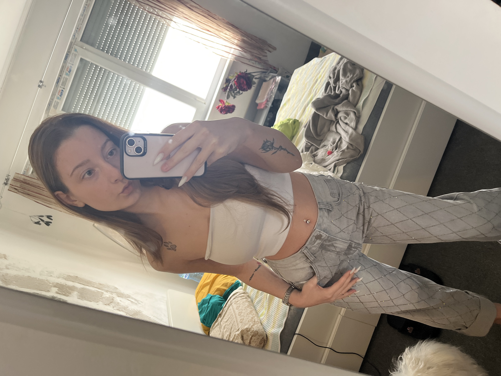 Woman takes mirror selfie in Varna, Bulgaria