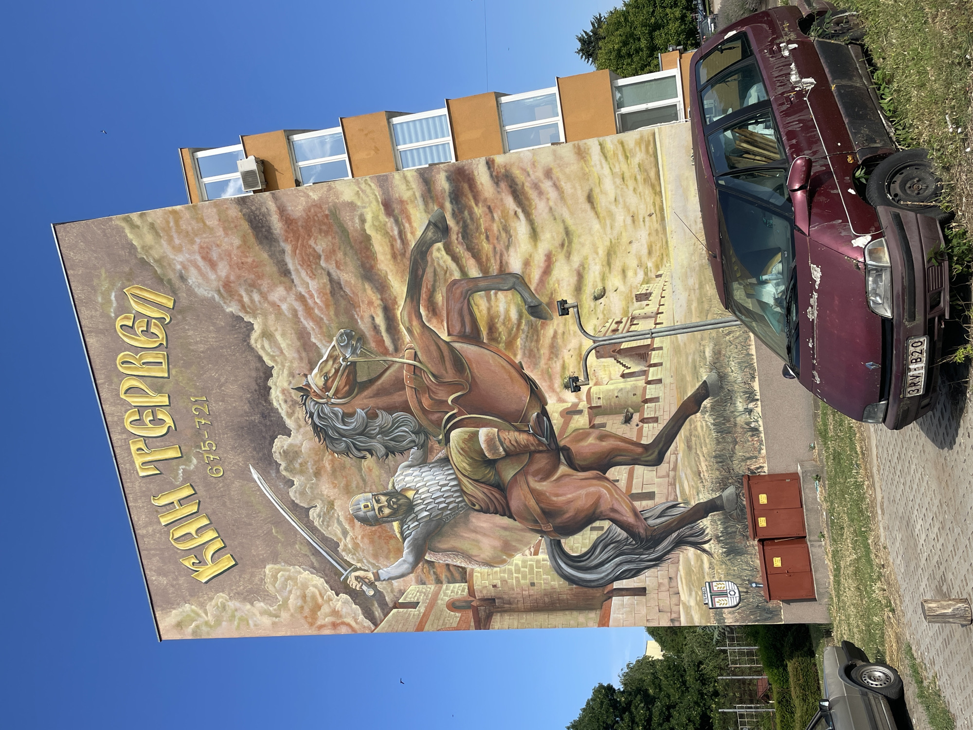 Khan Tervel mural dominates a building side in Tervel, Bulgaria