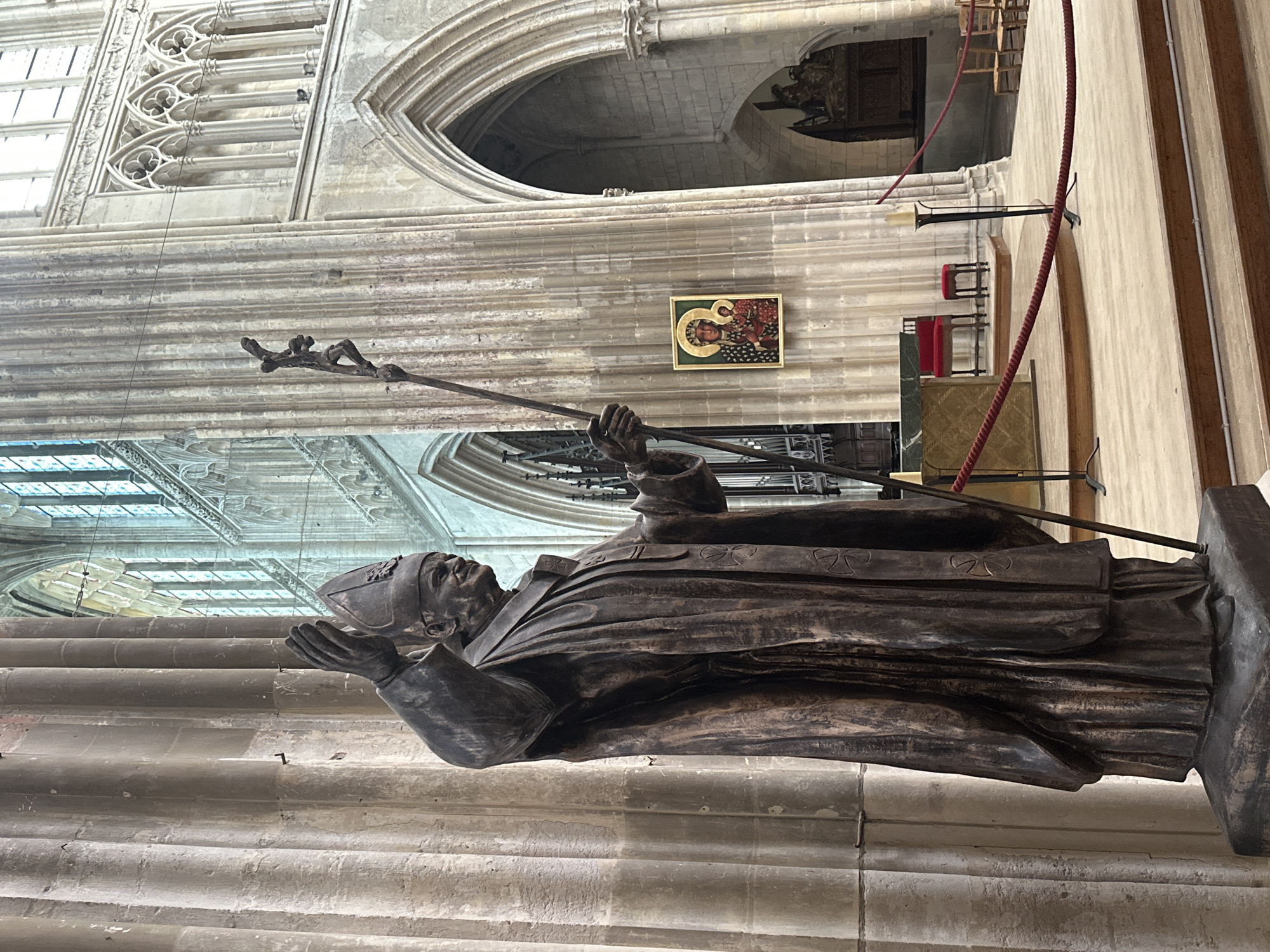 Inside Saint-Jacques church, Dieppe — statues, organ, and memorial details
