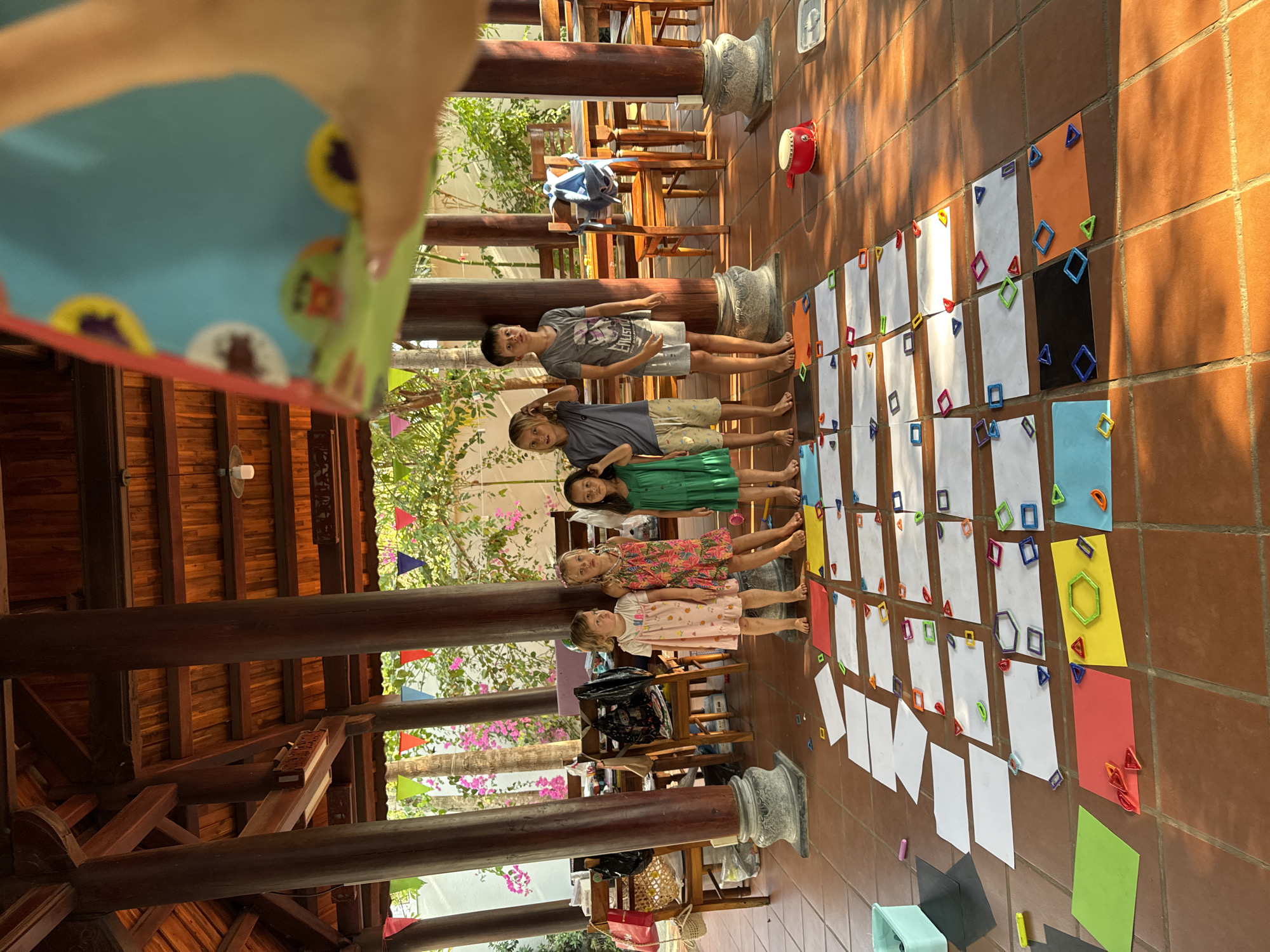 Children participate in educational grid activity in Mũi Né