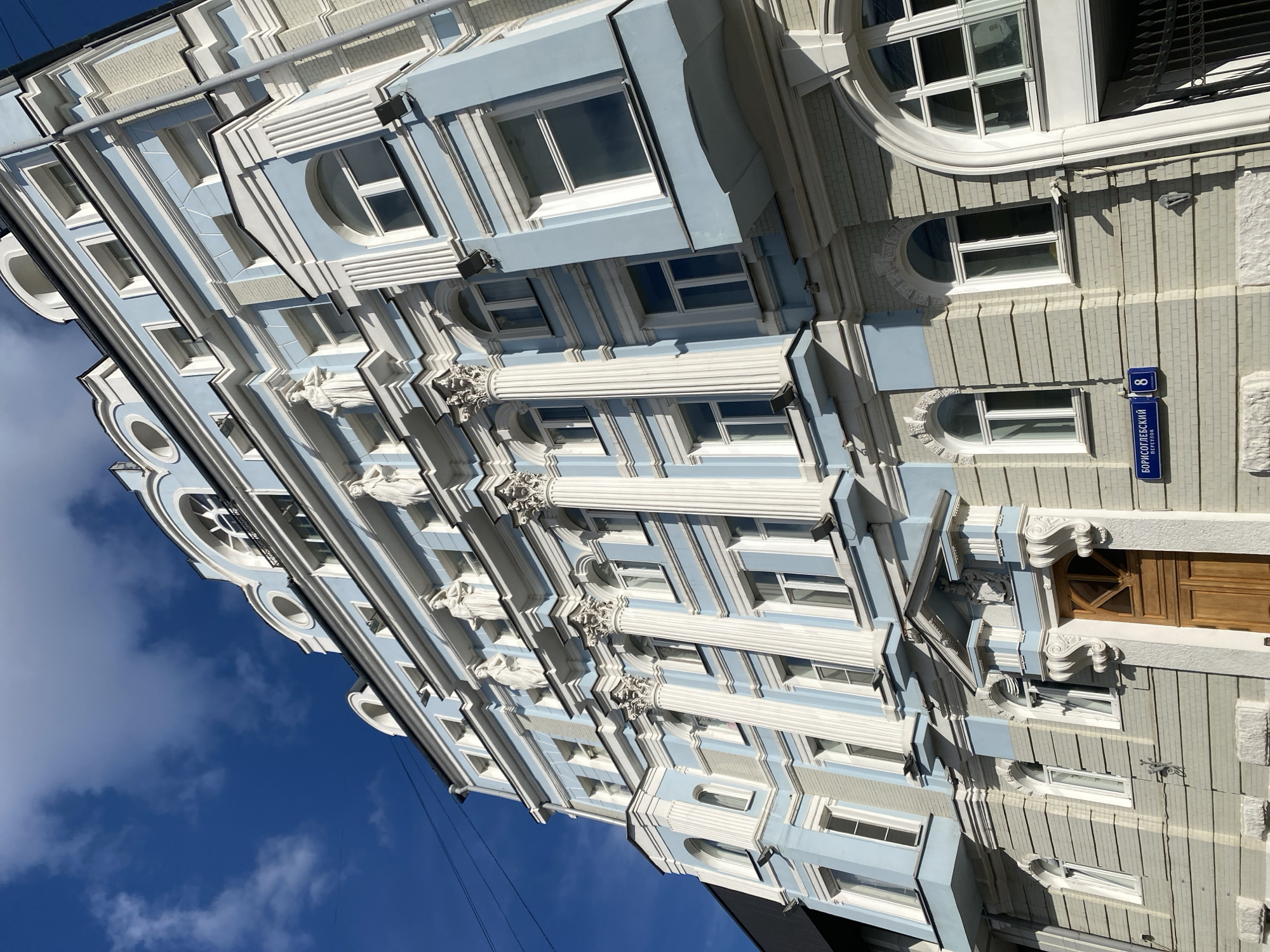 Classical blue-white building facade photographed in Moscow