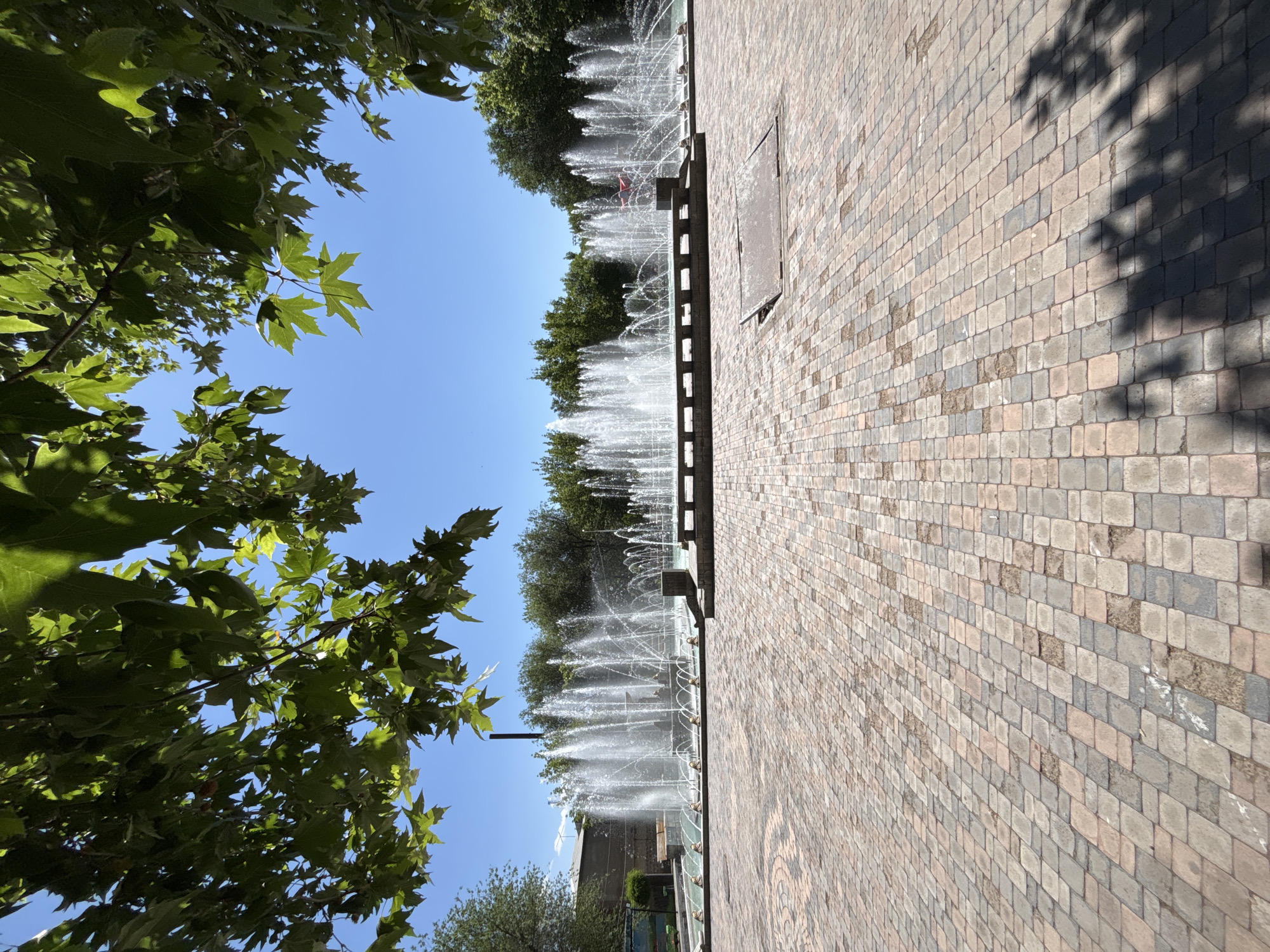 Daily life documented across central Yerevan parks and streets
