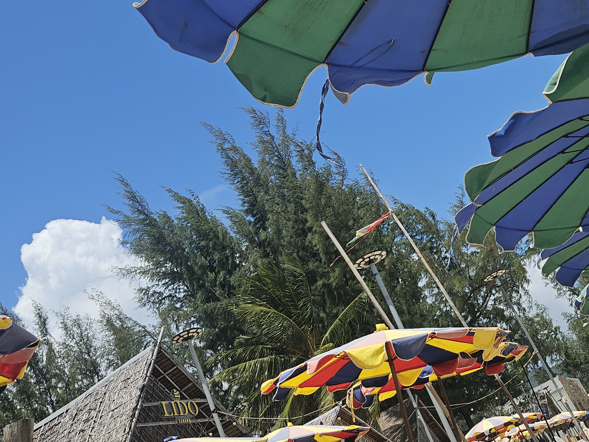 Morning beach life at a Choeng Thale resort, Phuket