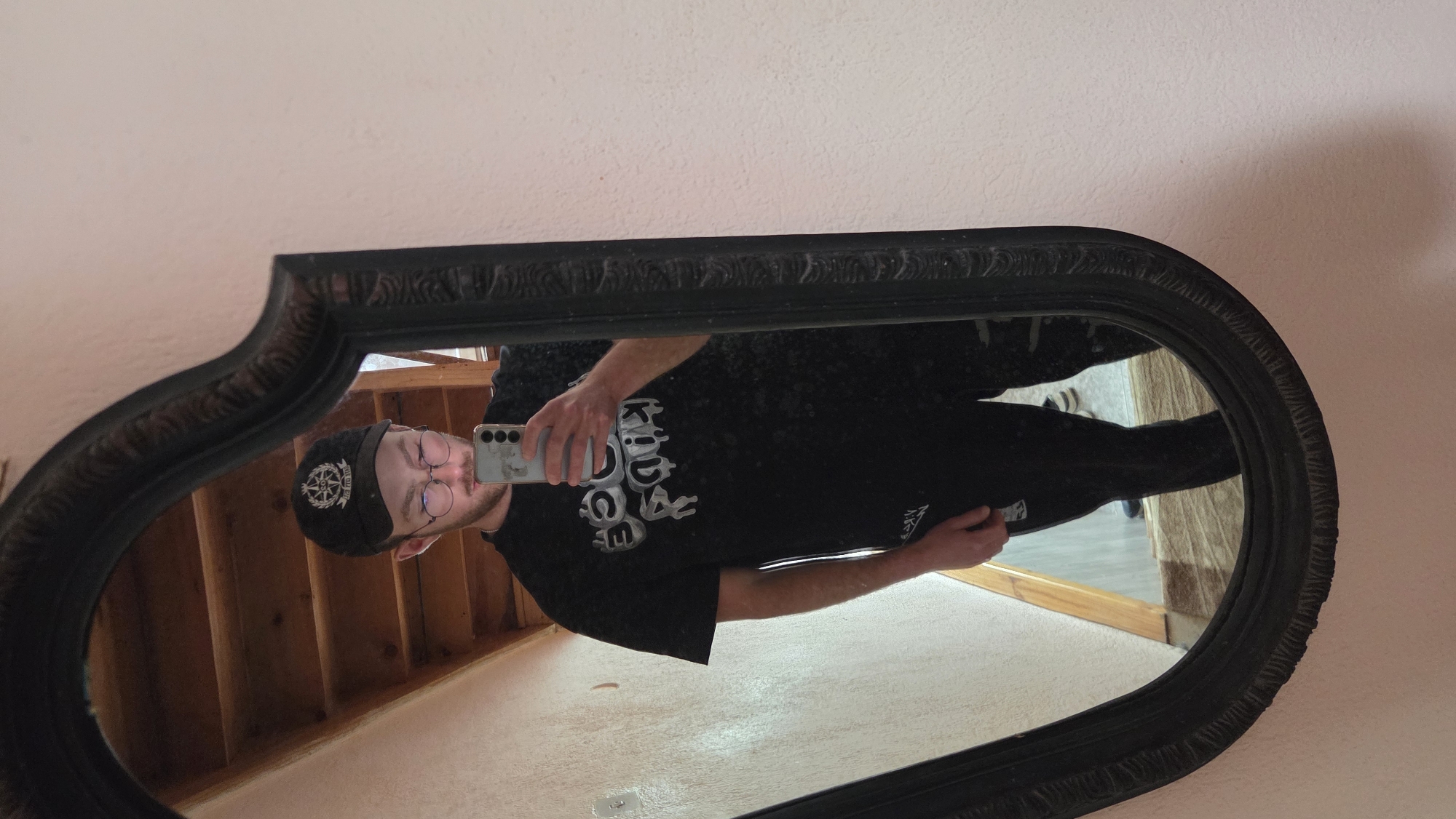 Man takes selfie in mirror in Bania, Bulgaria