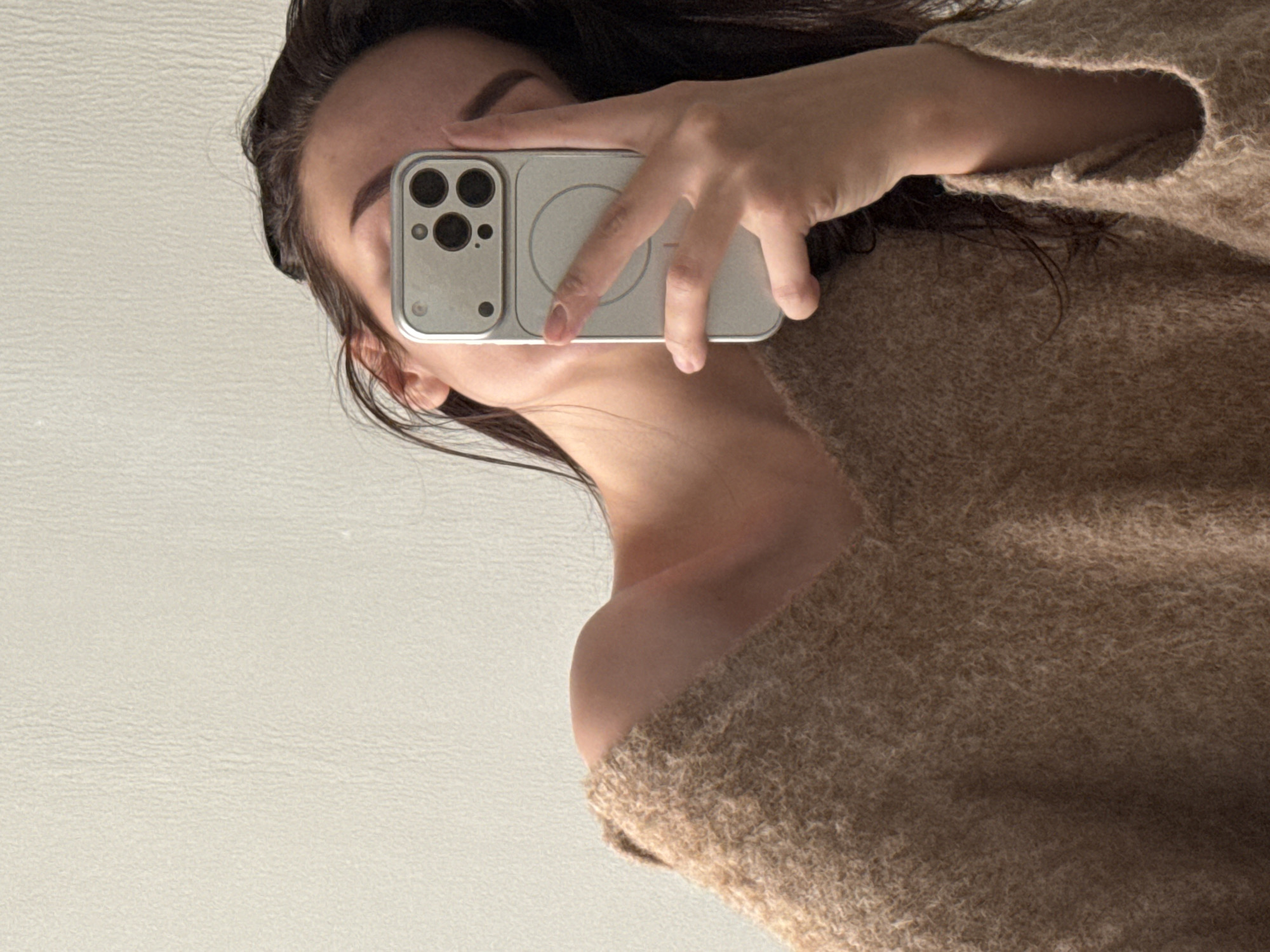 Woman takes mirror selfies during late-night snack in Russia
