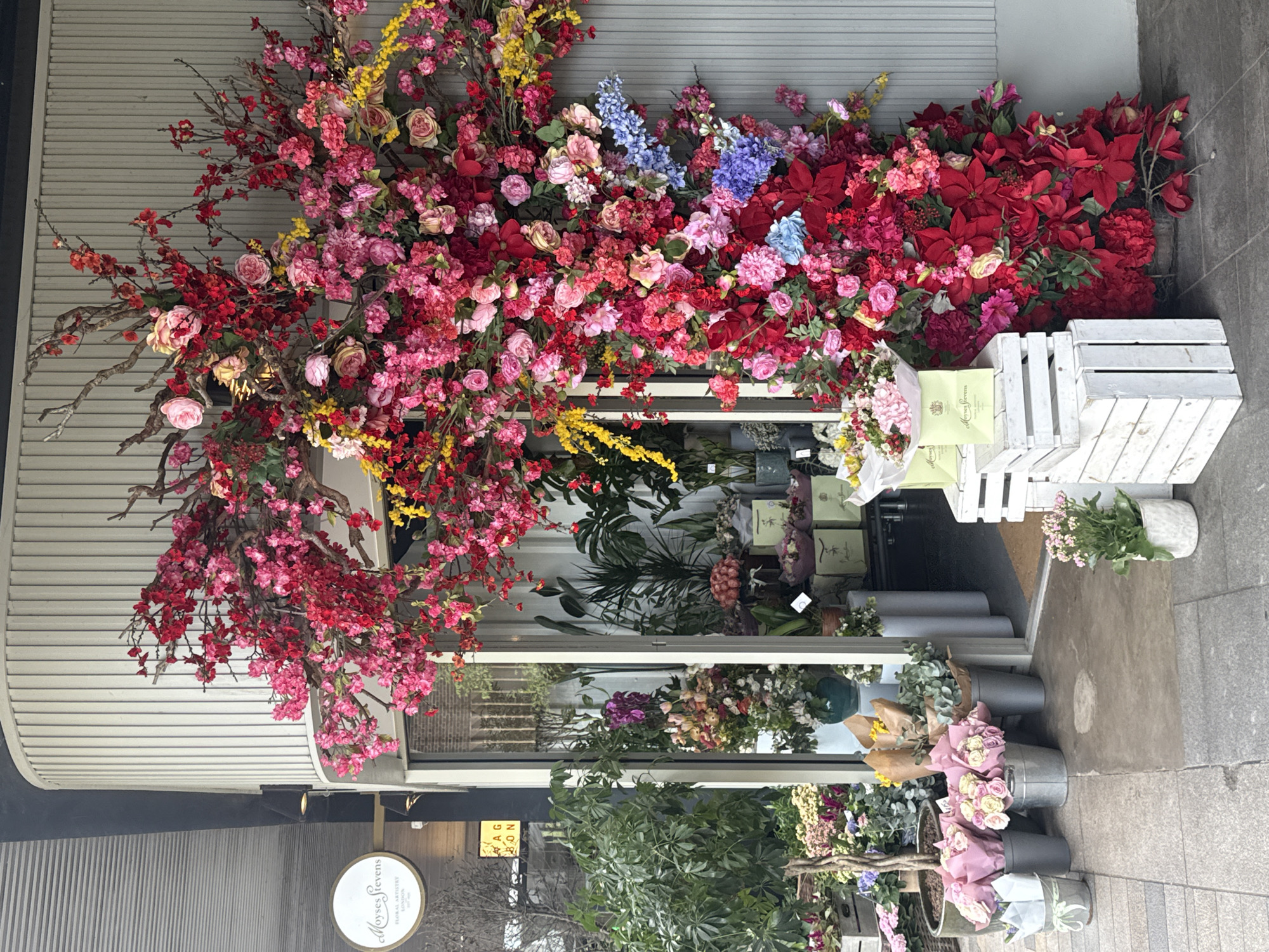 London witness captures flower shop, interior signage, abstract sculpture