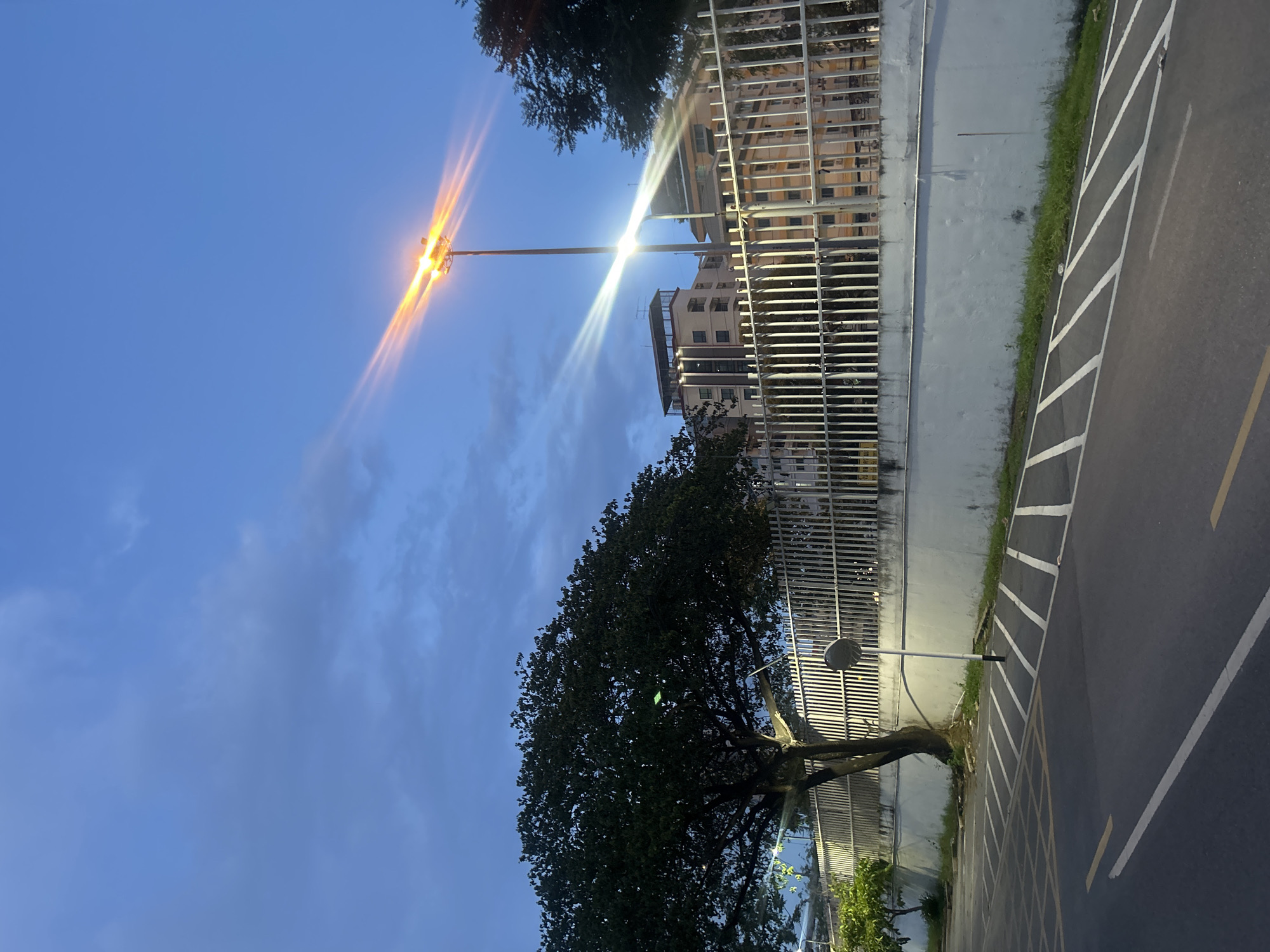 Commercial streetscape and local landmarks in Tha Khlong, Thailand