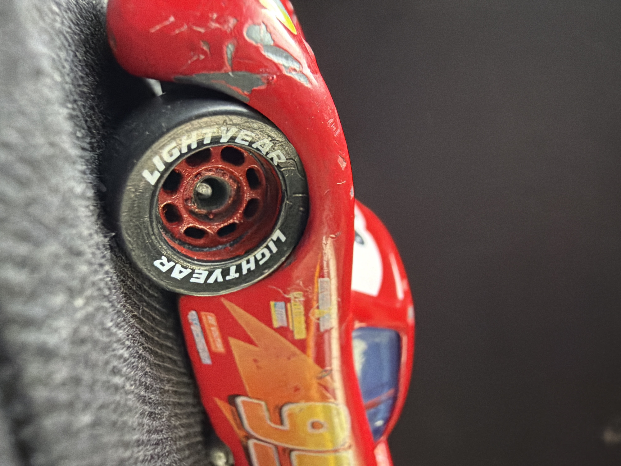 Worn Lightning McQueen toy photographed in Russian village