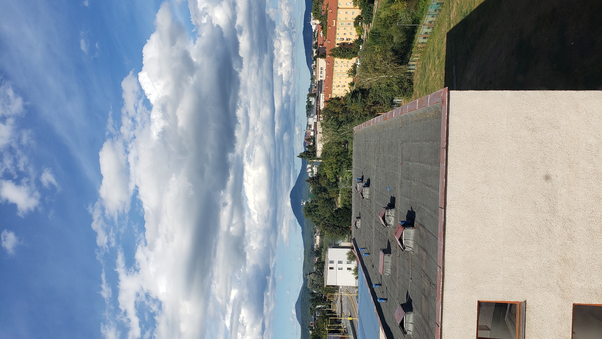 Rooftop views over Prešov with Šariš Castle on the horizon