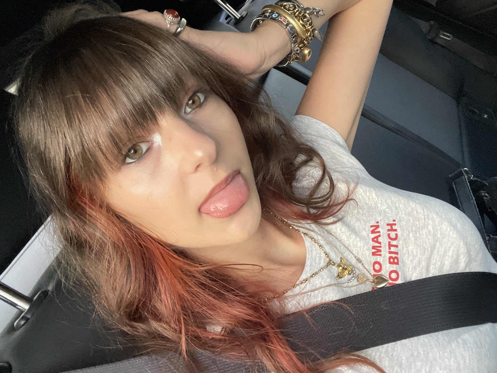 Woman takes car selfie in Raanana