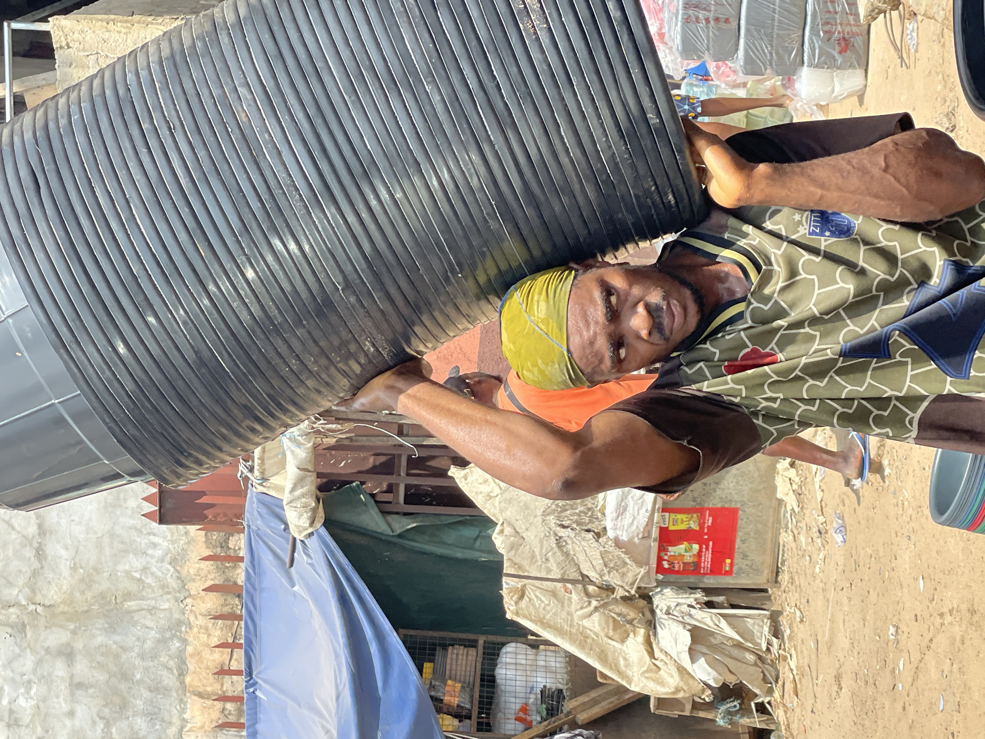 Urban marketplace and soccer field activities documented across city