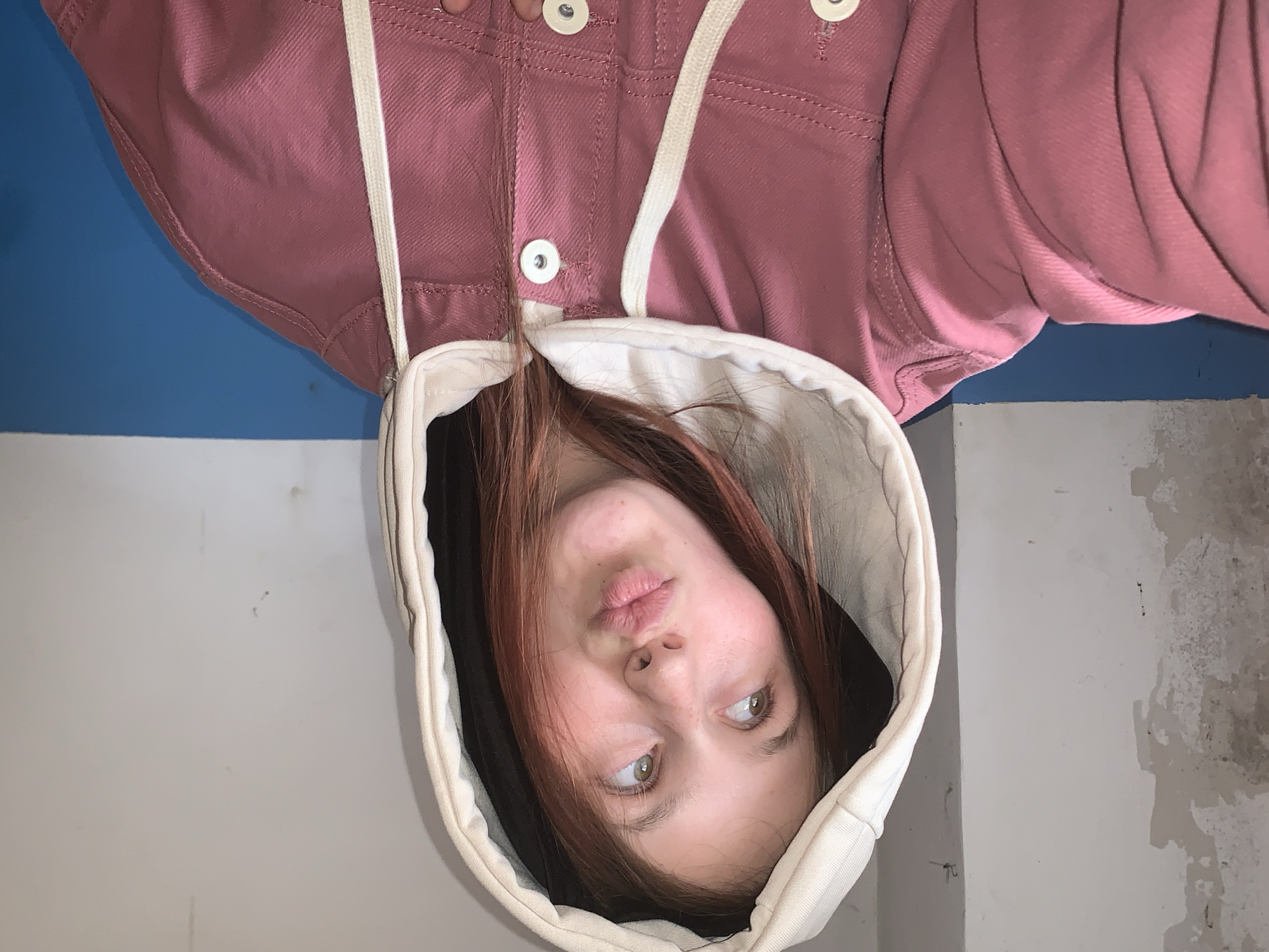 Upside-down portrait captured in Foki shows pensive young person