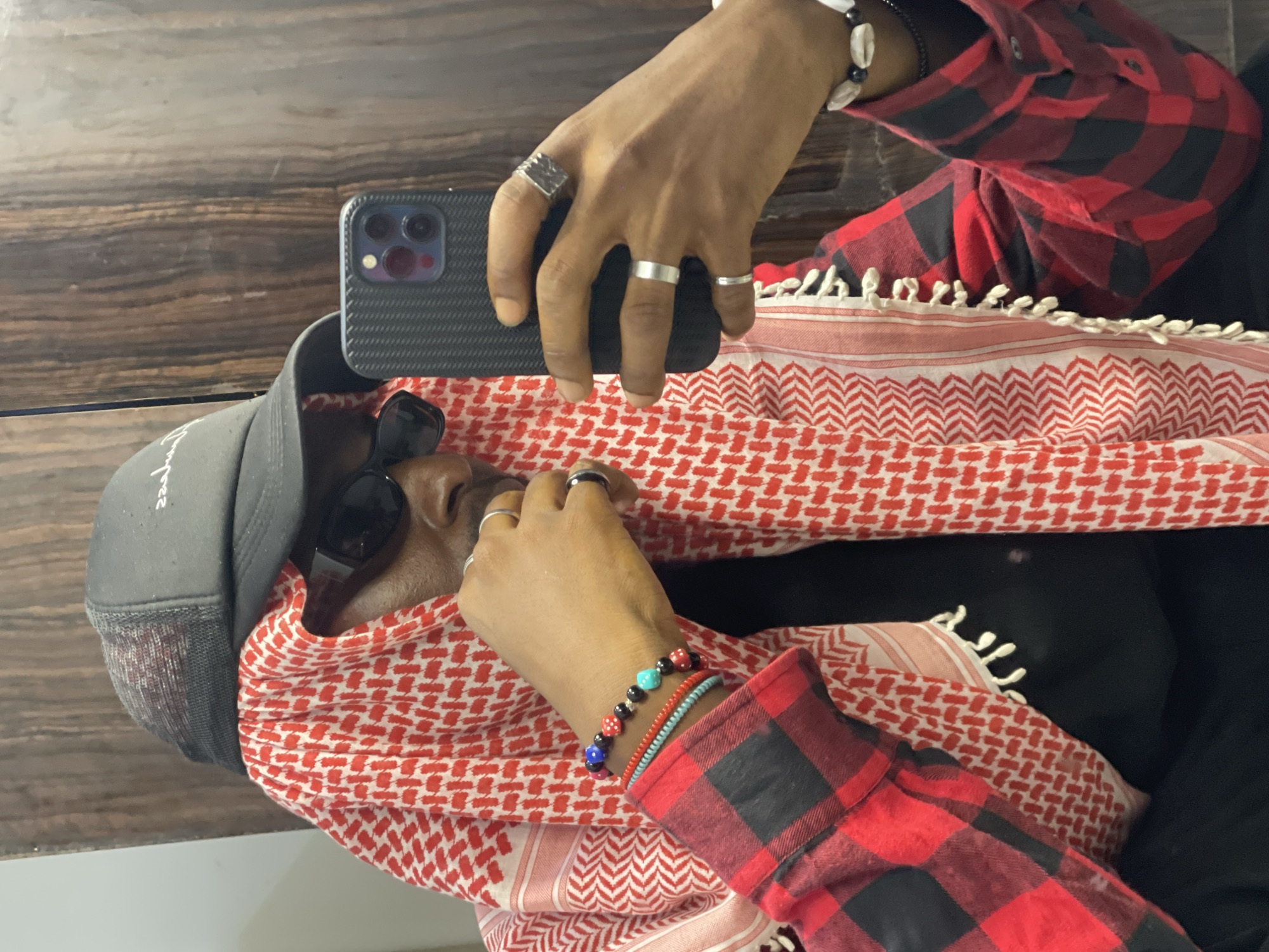 Late-night selfie session in Abuja, consistent outfit throughout