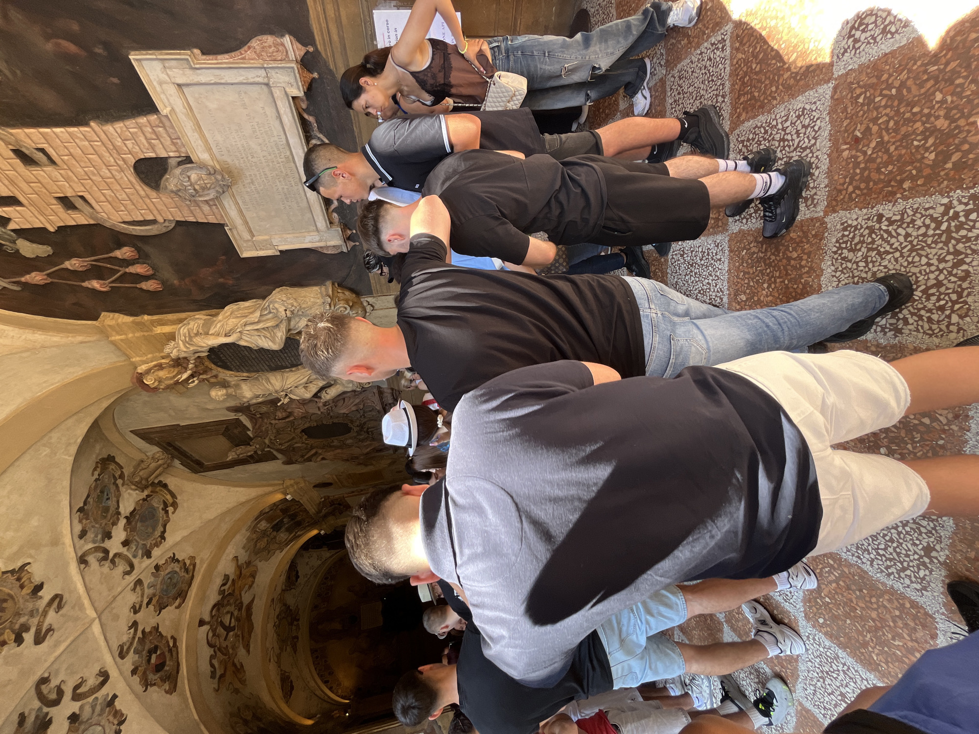 Tourists explore historic Bologna palaces during morning visit