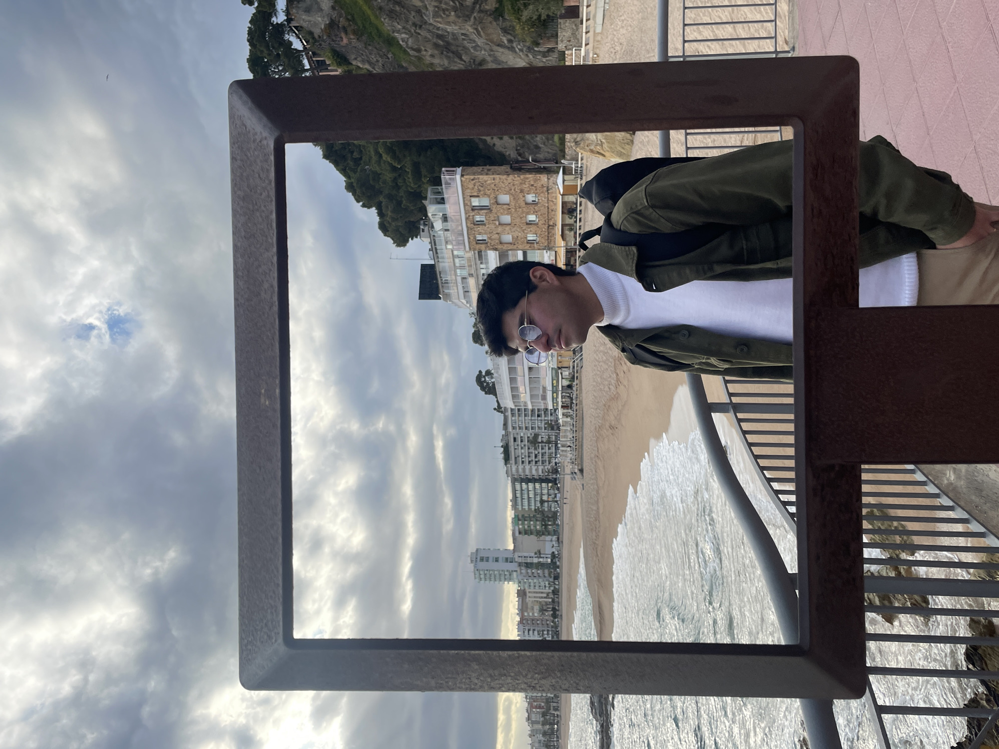 Tourists explore coastal paths and beaches in Lloret de Mar