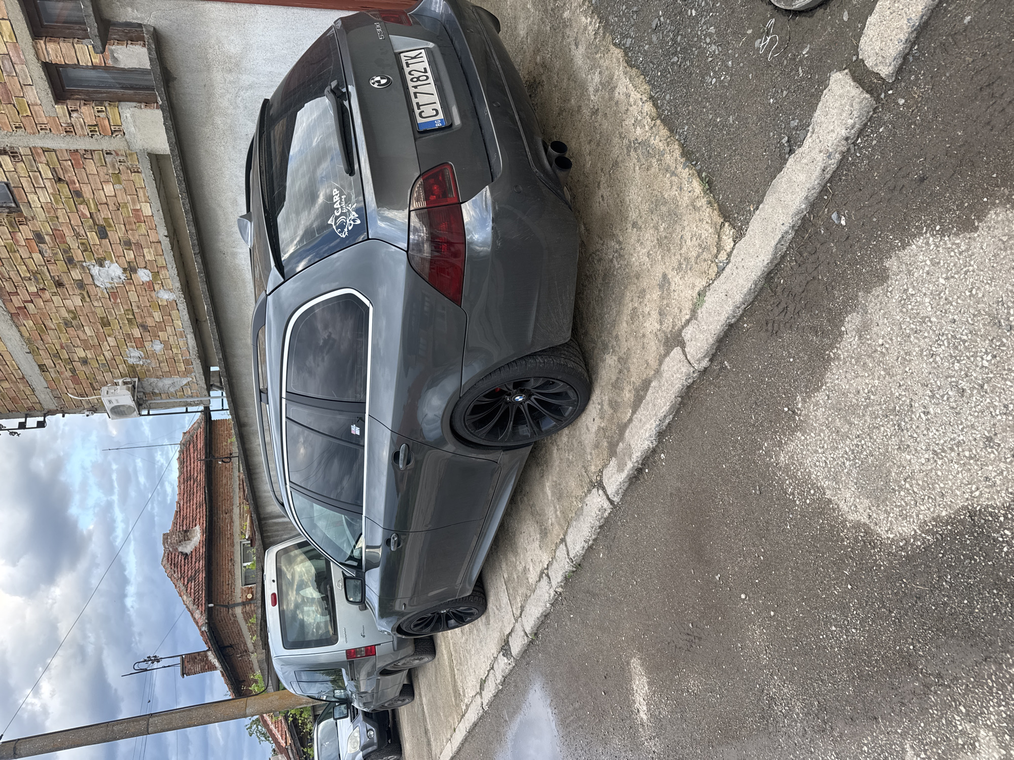 Casual afternoon documented in Bulgarian village with BMW, beer