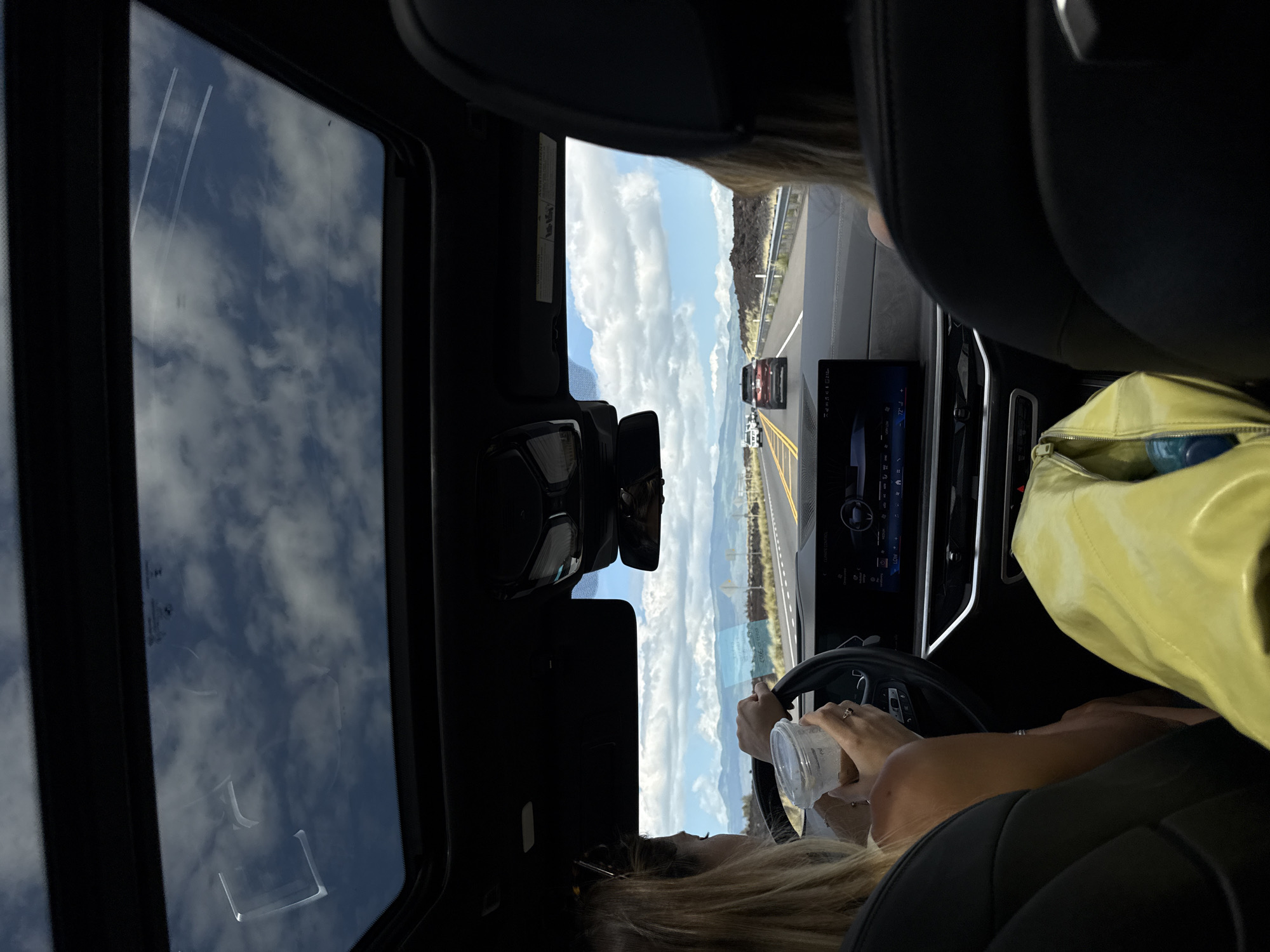 Passenger captures sky view through sunroof at Hawaii resort