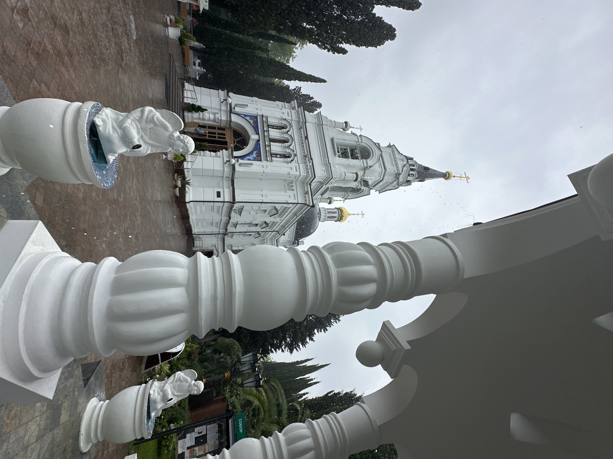 Orthodox church and harbor-side drinks on a Sochi morning