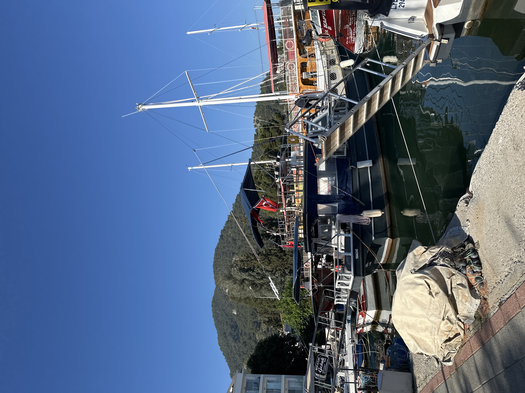 Clear skies over Fethiye marina as boats dock peacefully
