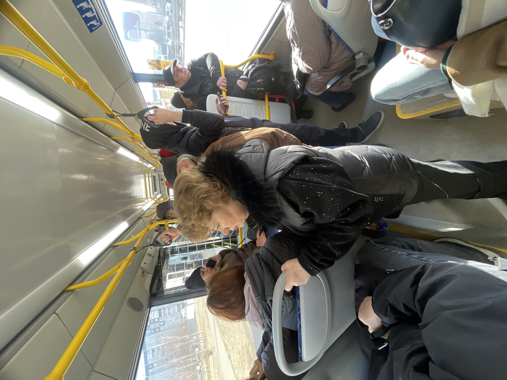 Crowded late-night bus ride documented in Krasnoyarsk, Russia