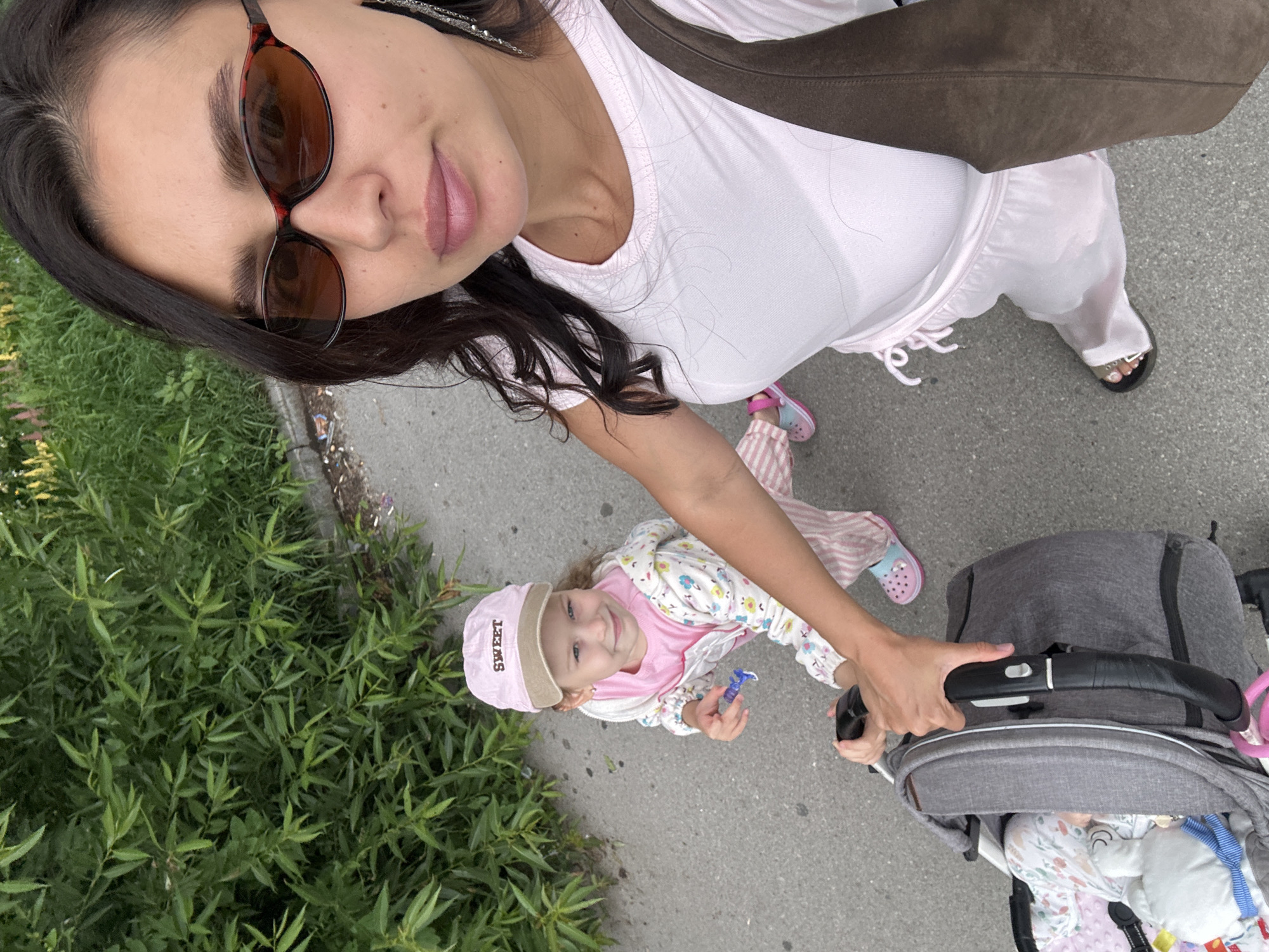 Casual morning out near a Perm café with a stroller in tow