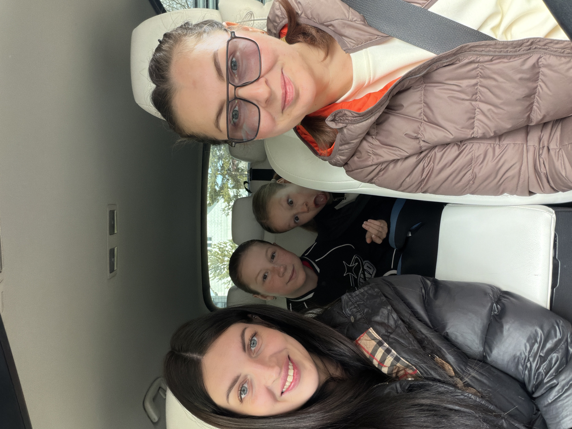Four people photographed in vehicle in Markovo, Russia