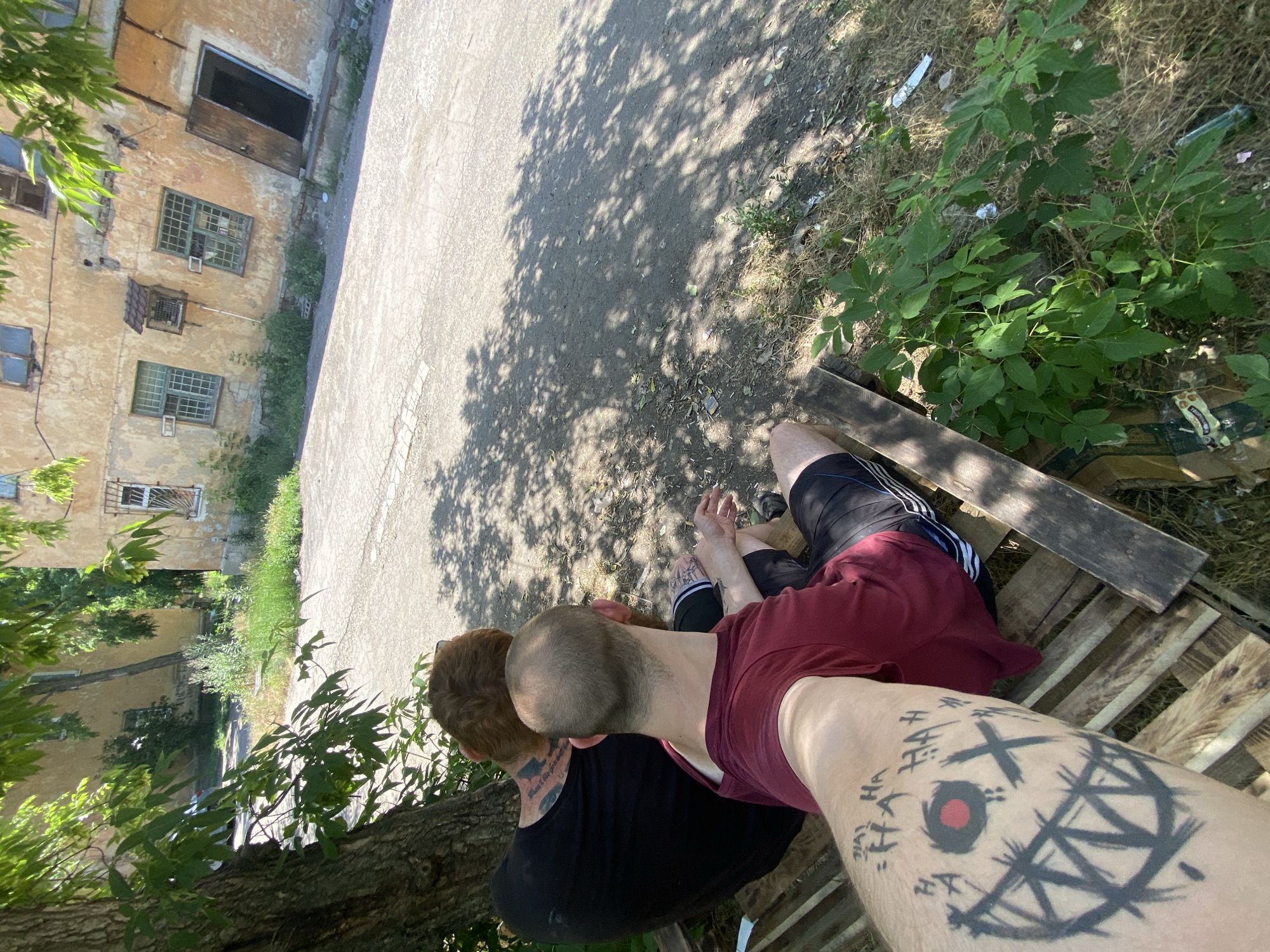Hanging out at a rundown outdoor spot, selfies and all