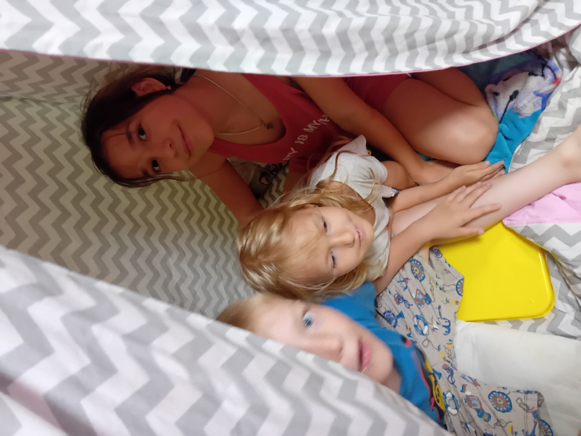 Kids in a tent and rose bouquets in Chuhuiv