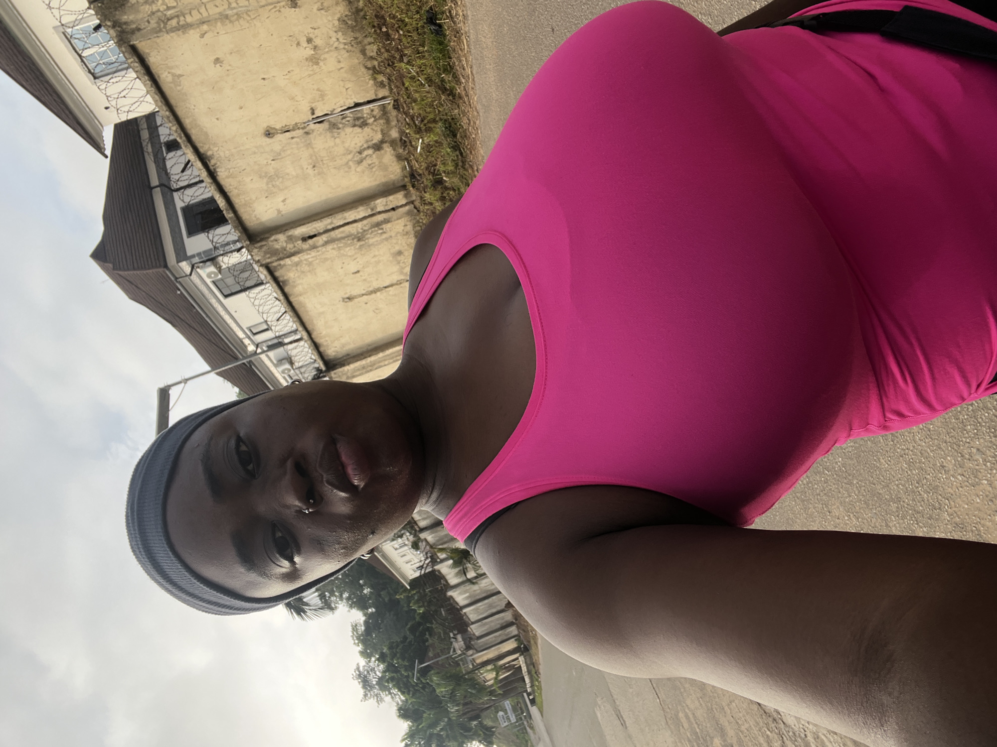 Morning street life in a residential Abuja neighborhood